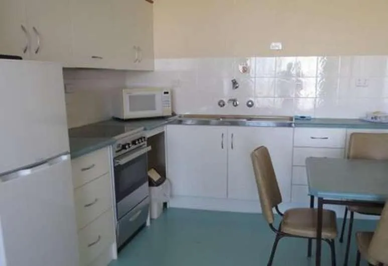 Kitchen or kitchenette in Stansbury Holiday Motel
