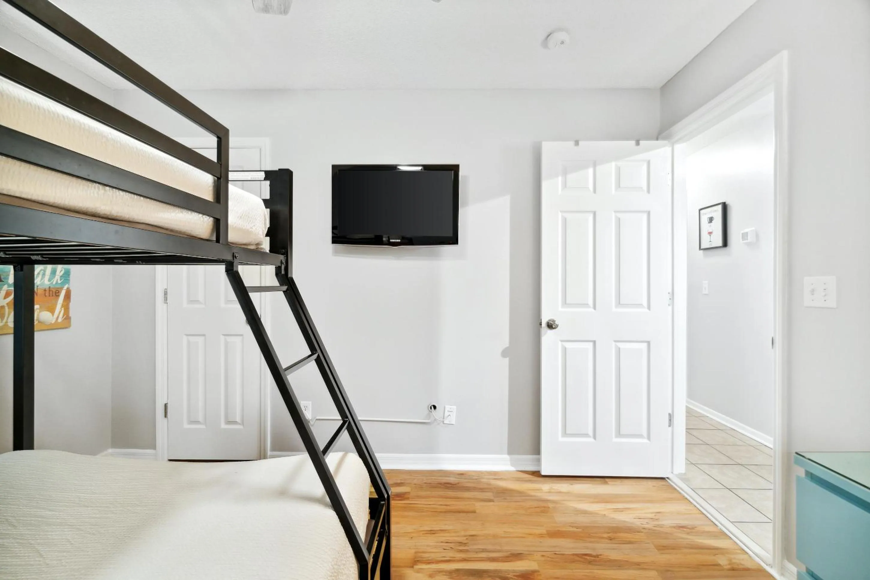 Bed in Beachside Villas by Panhandle Getaways