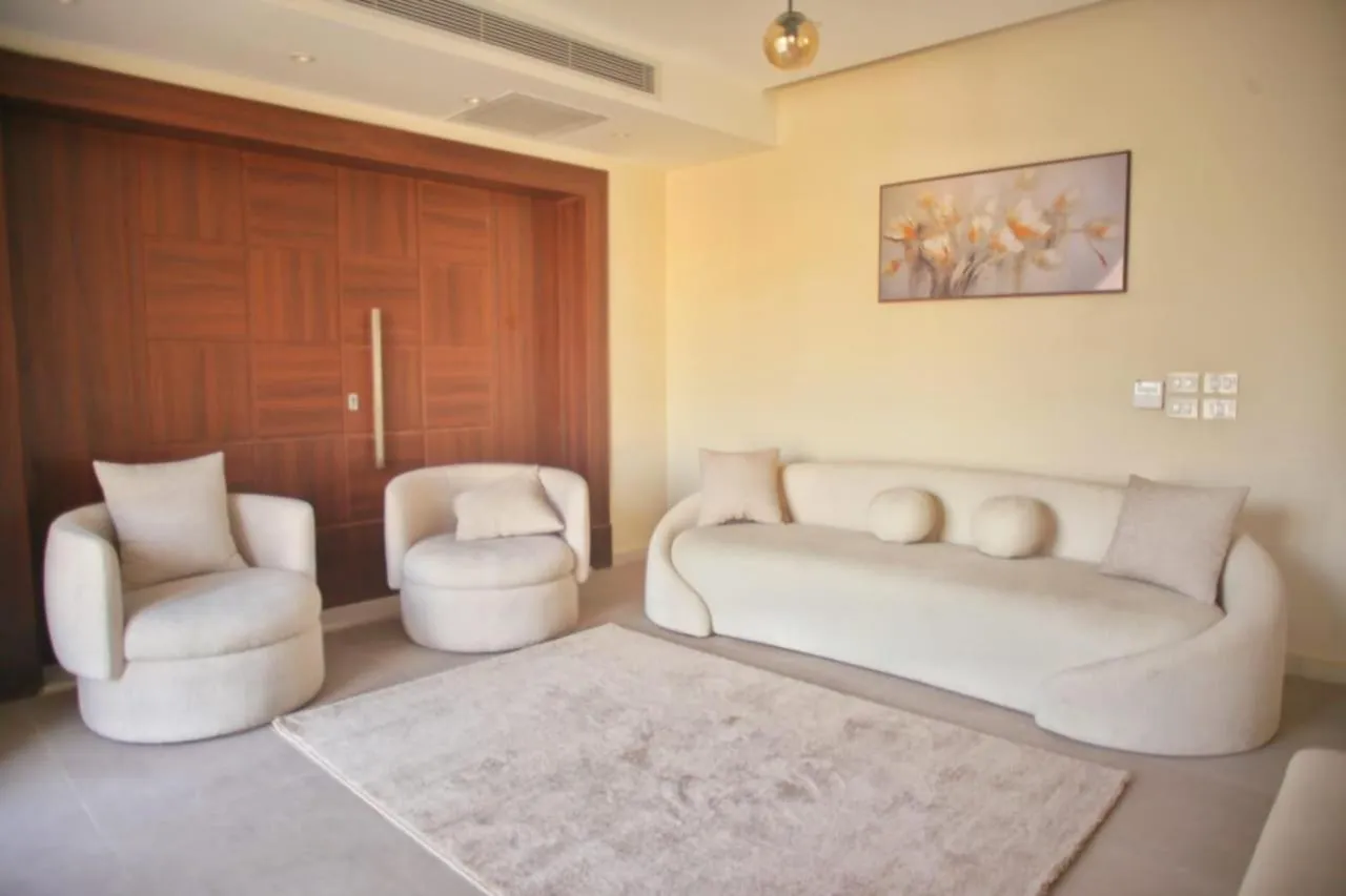 Living room in Settle Inn Cairo Festival City Villa