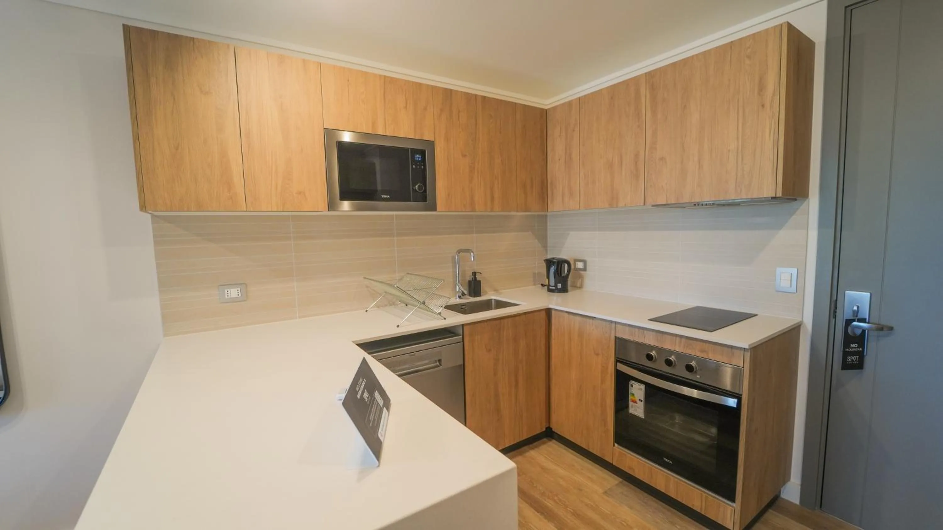 Kitchen or kitchenette in Spot Suites