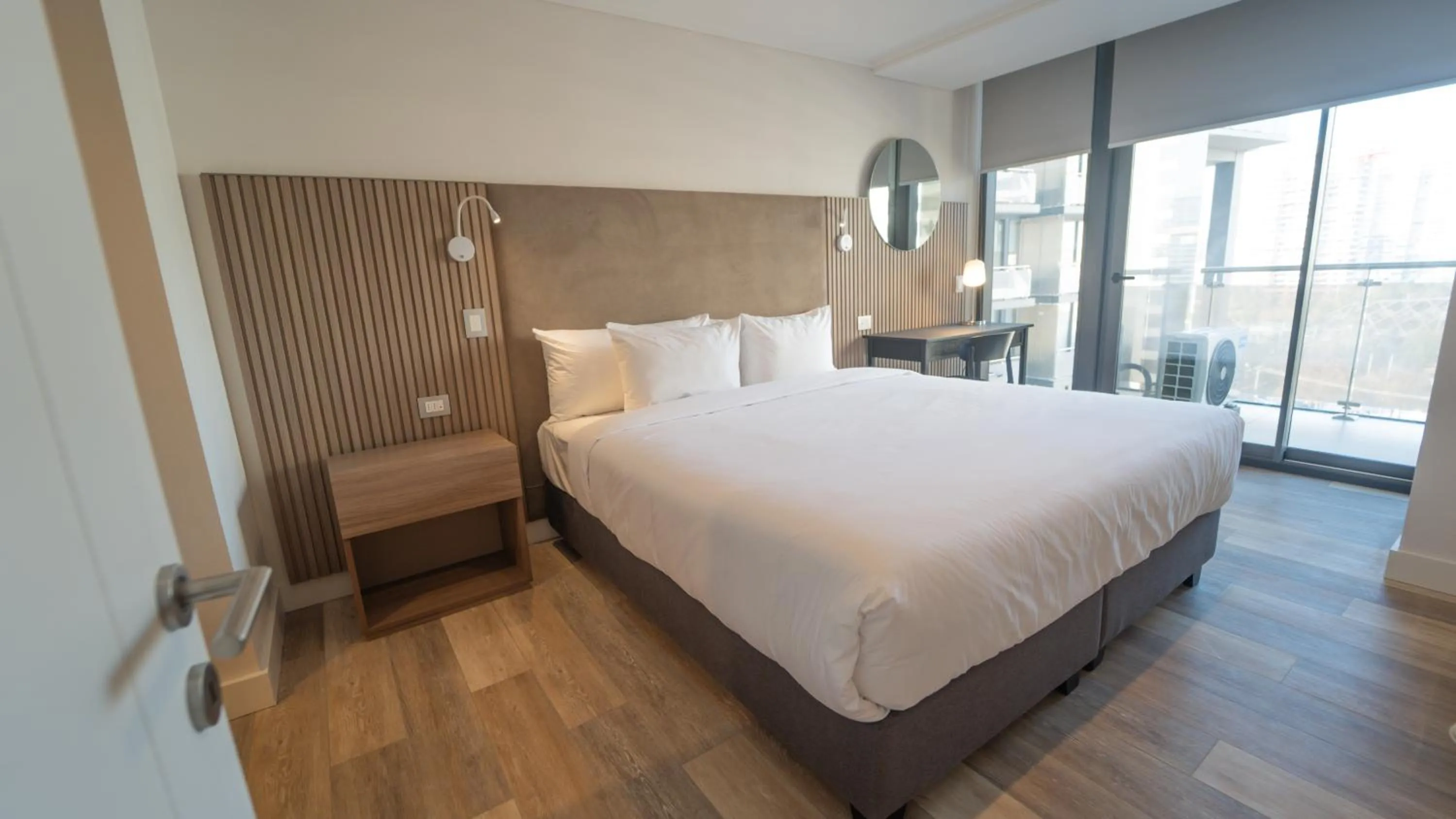 Photo of the whole room, Bed in Spot Suites