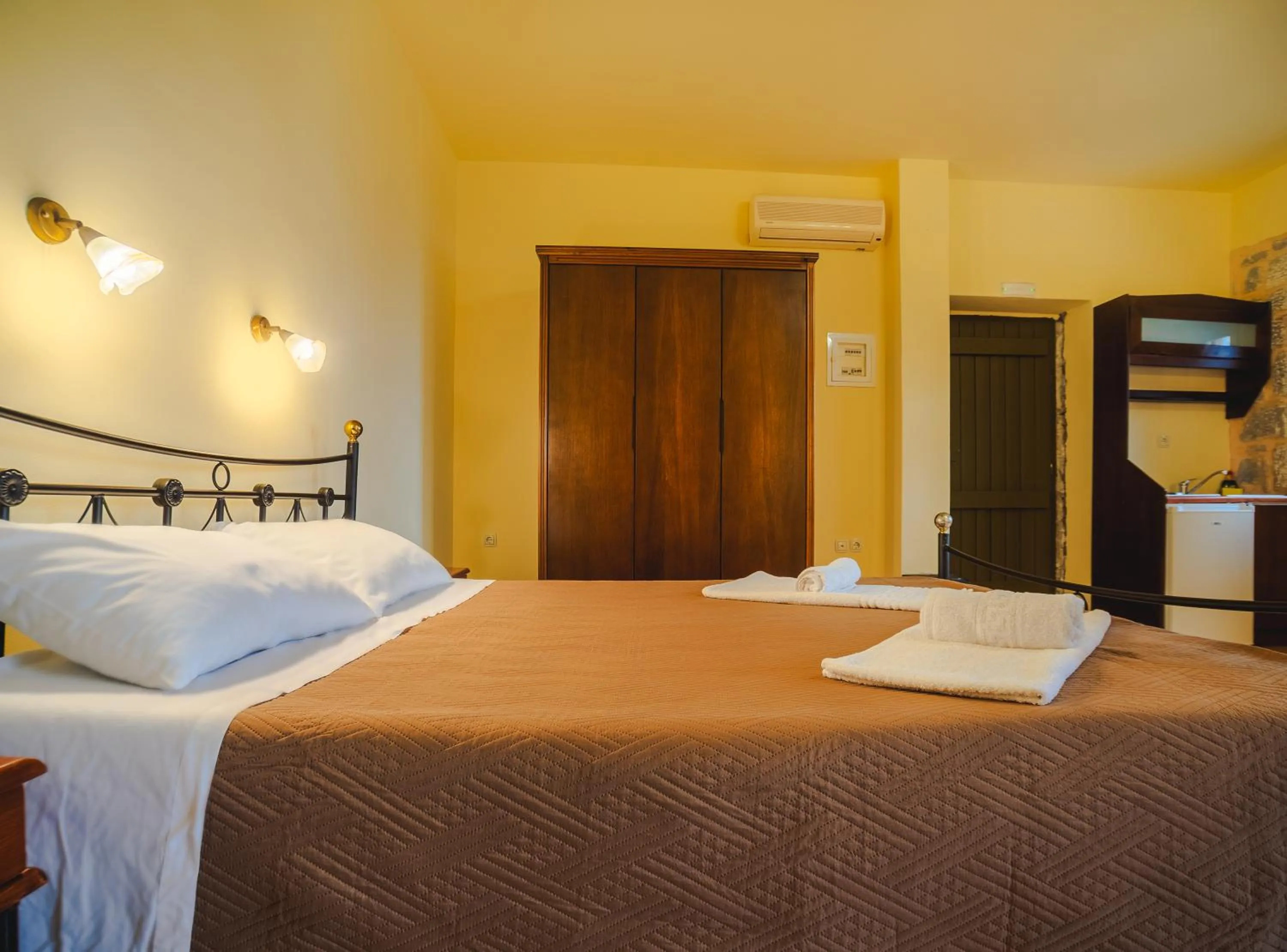 Bed in Onar Mani Suites