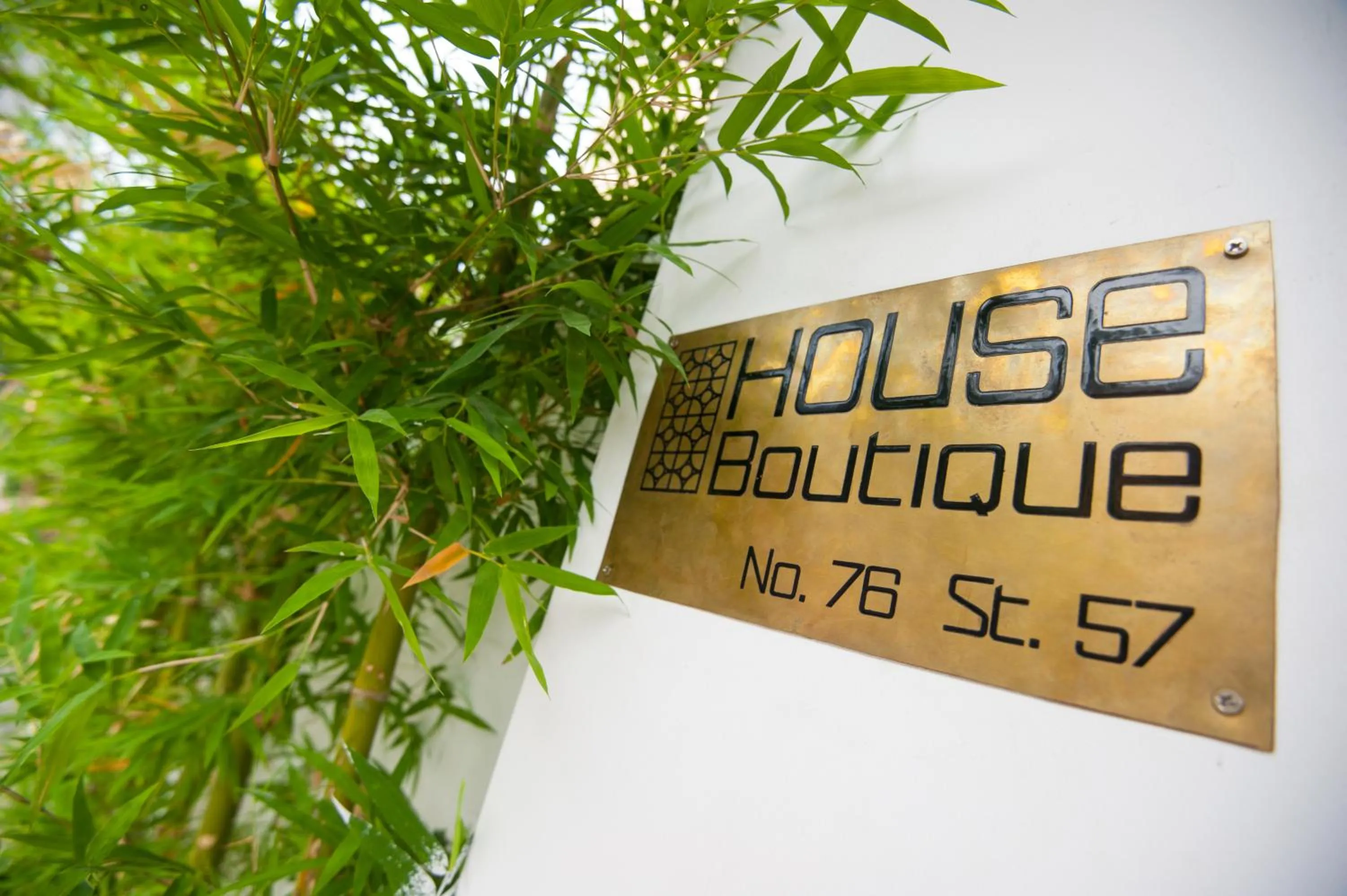 Property logo or sign in House Boutique Eco Hotel
