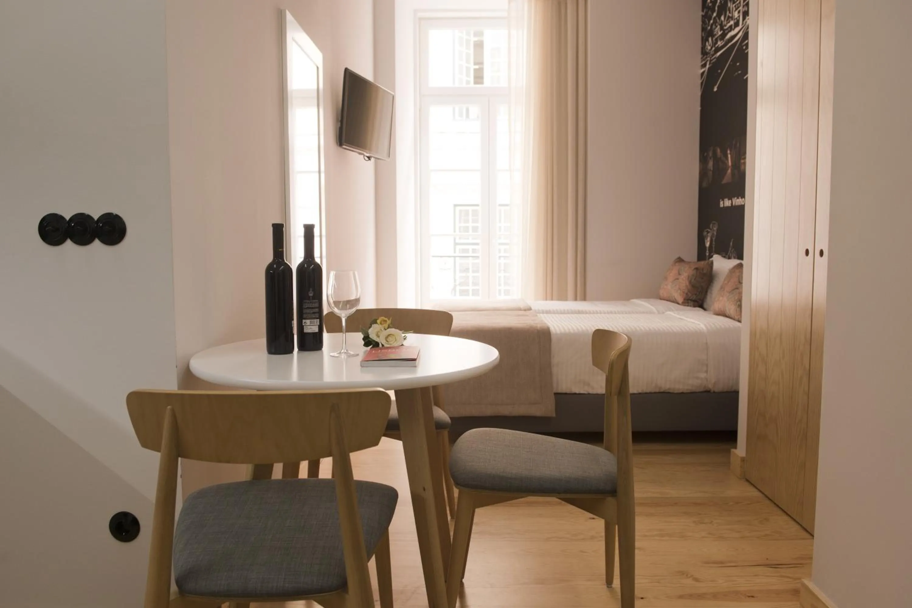 Dining area, Bed in Páteo Saudade Lofts