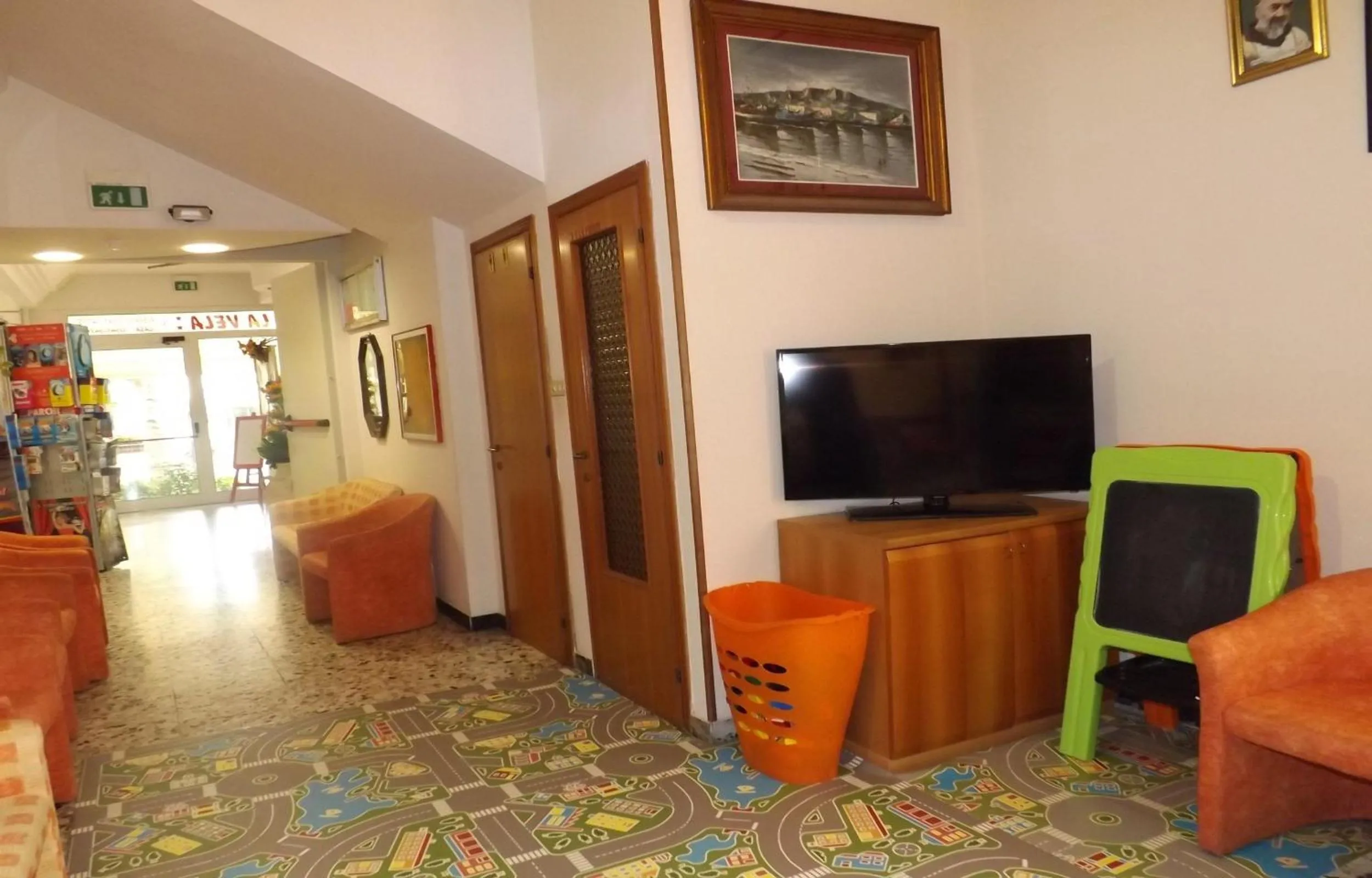 Communal lounge/ TV room in Hotel La Vela