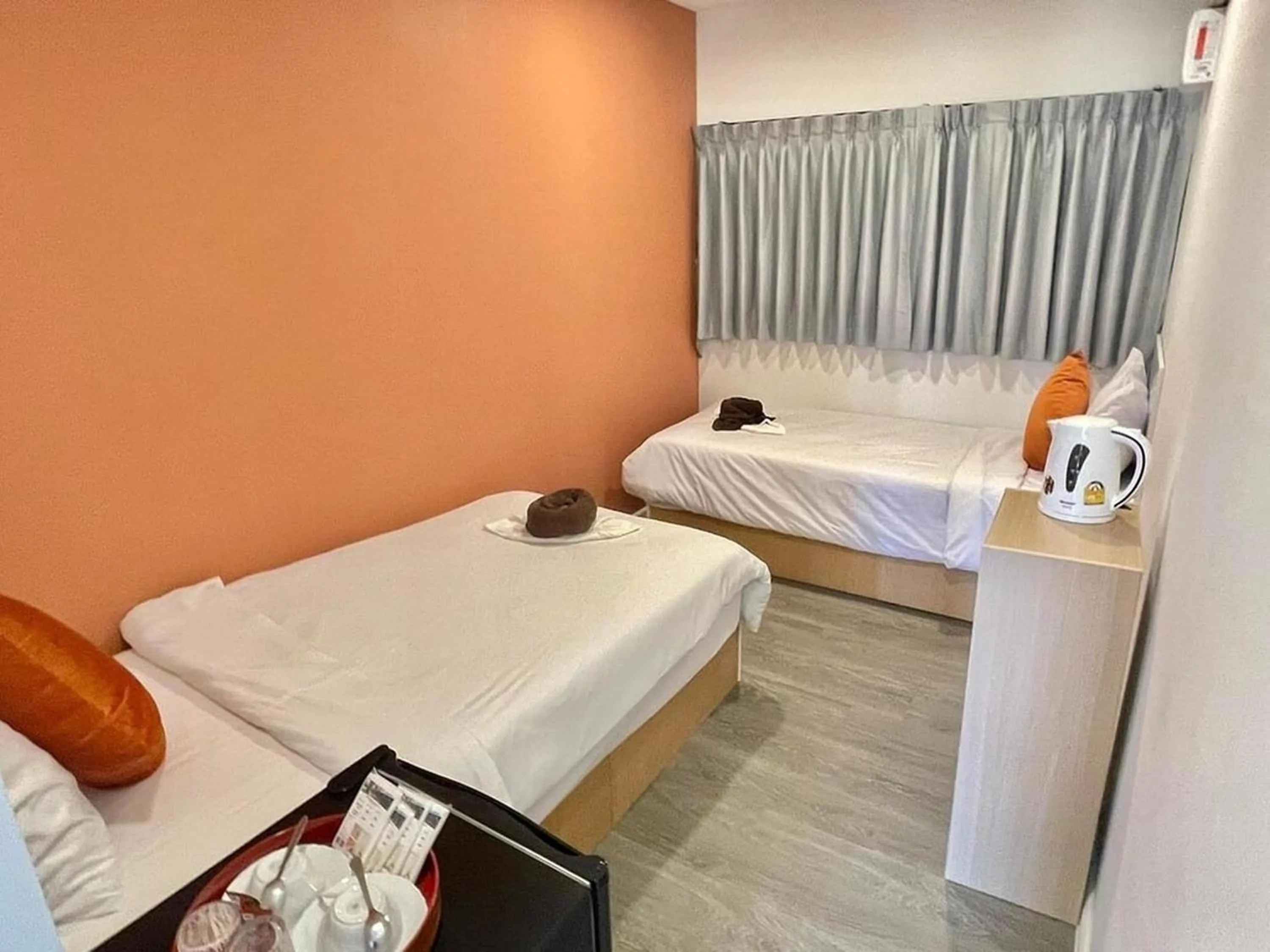 Bed in Nomads Homestay Sriracha