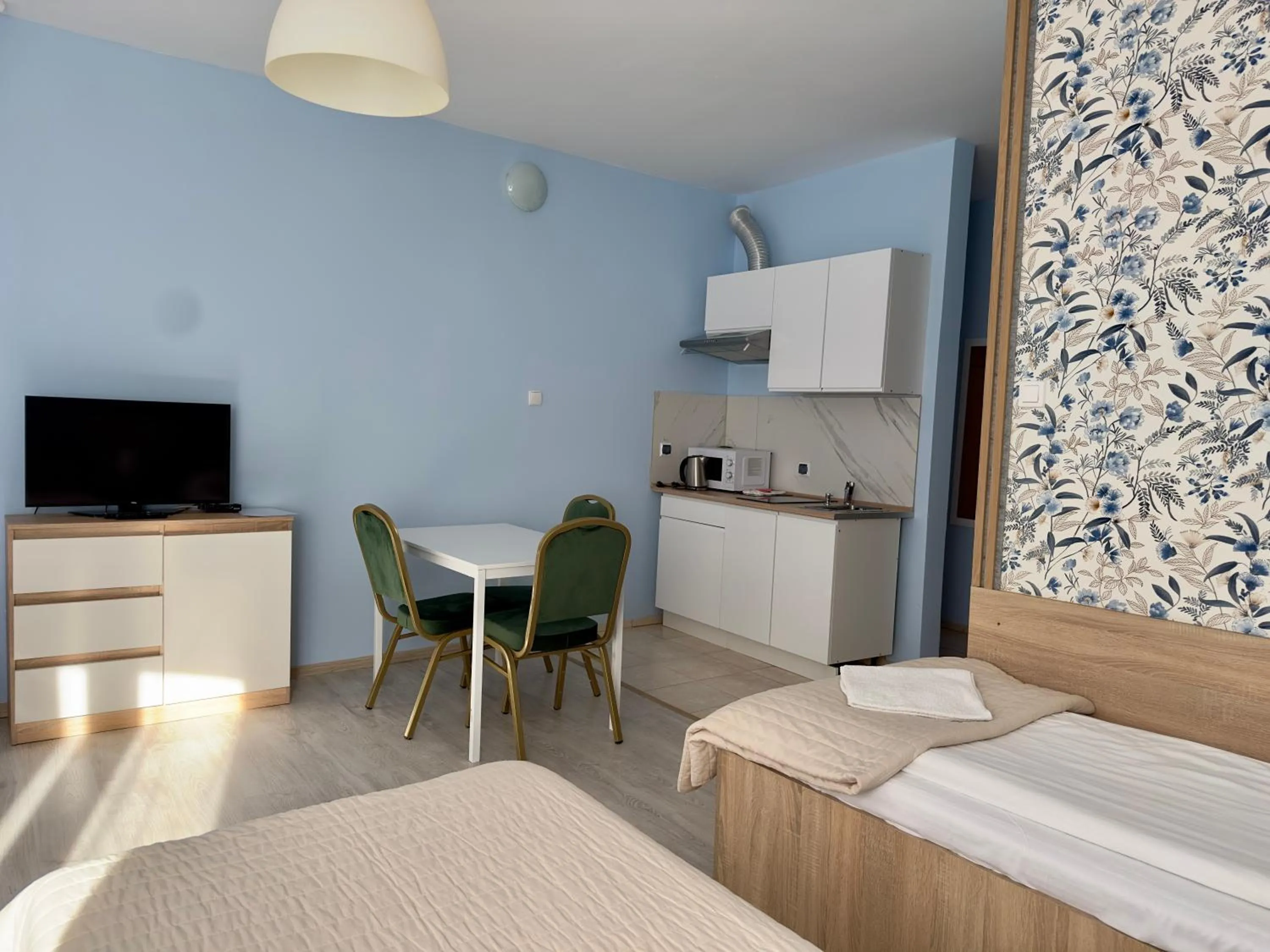 Kitchen or kitchenette, Bed in Apartamenty Dolna Kraków