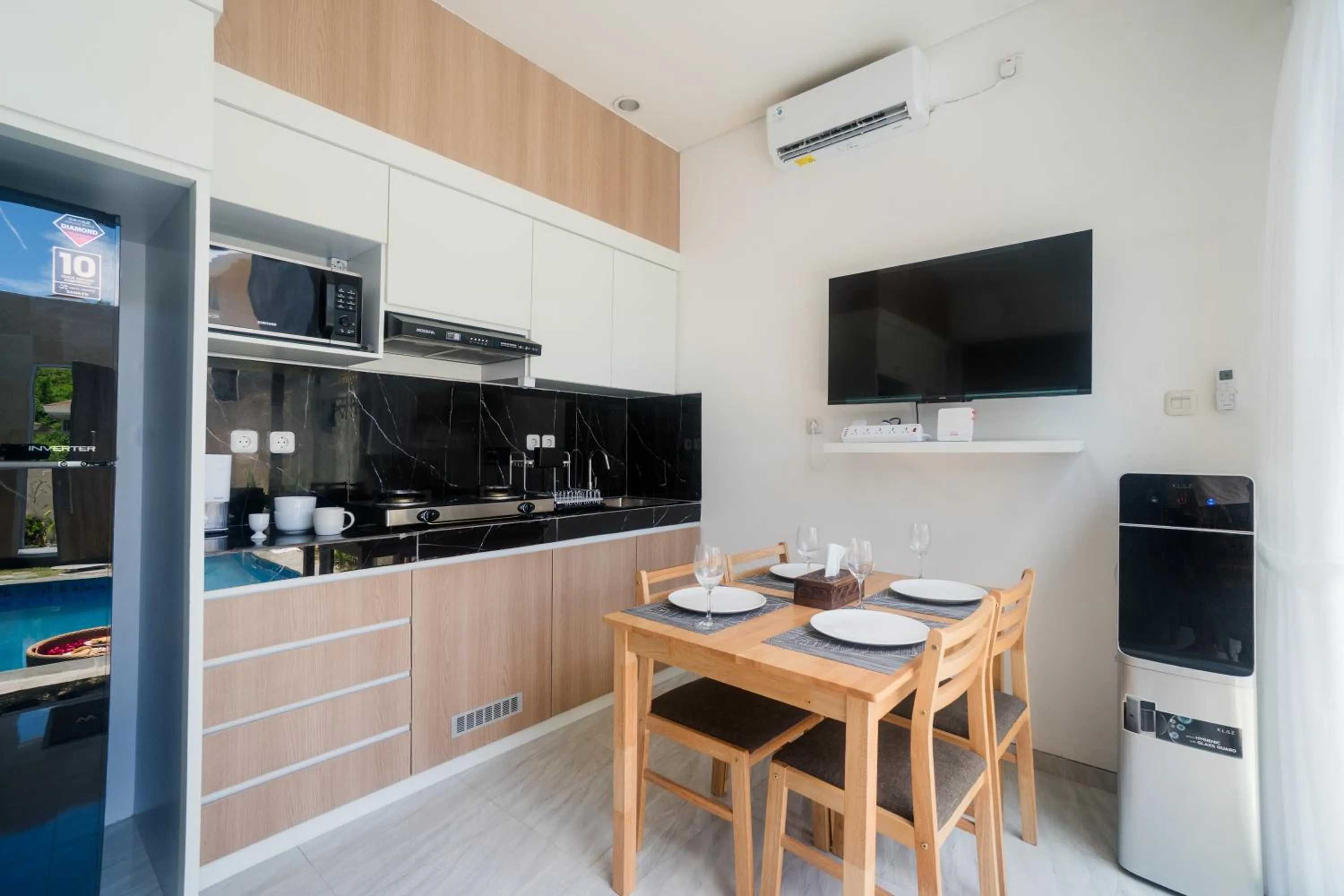Kitchen or kitchenette in Otia Villa Nusa Dua by Premier Hospitality Asia