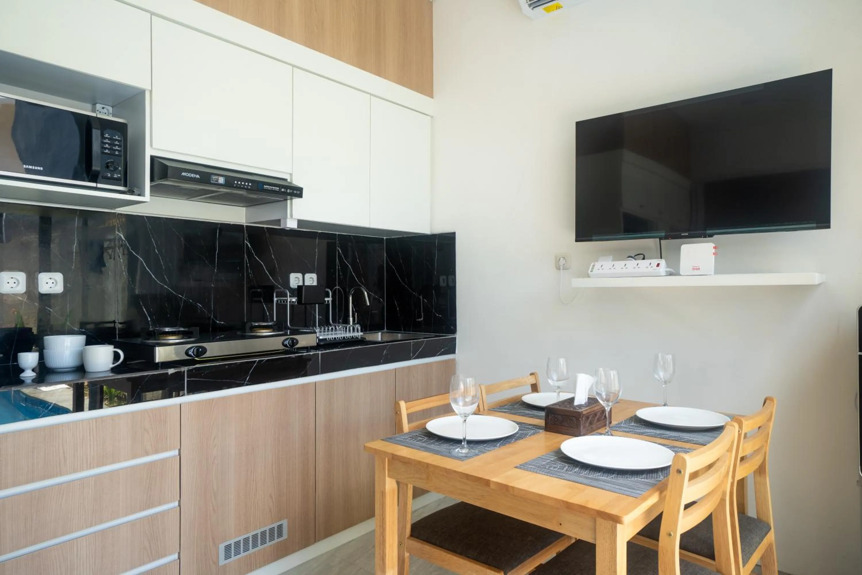 Communal lounge/ TV room in Otia Villa Nusa Dua by Premier Hospitality Asia