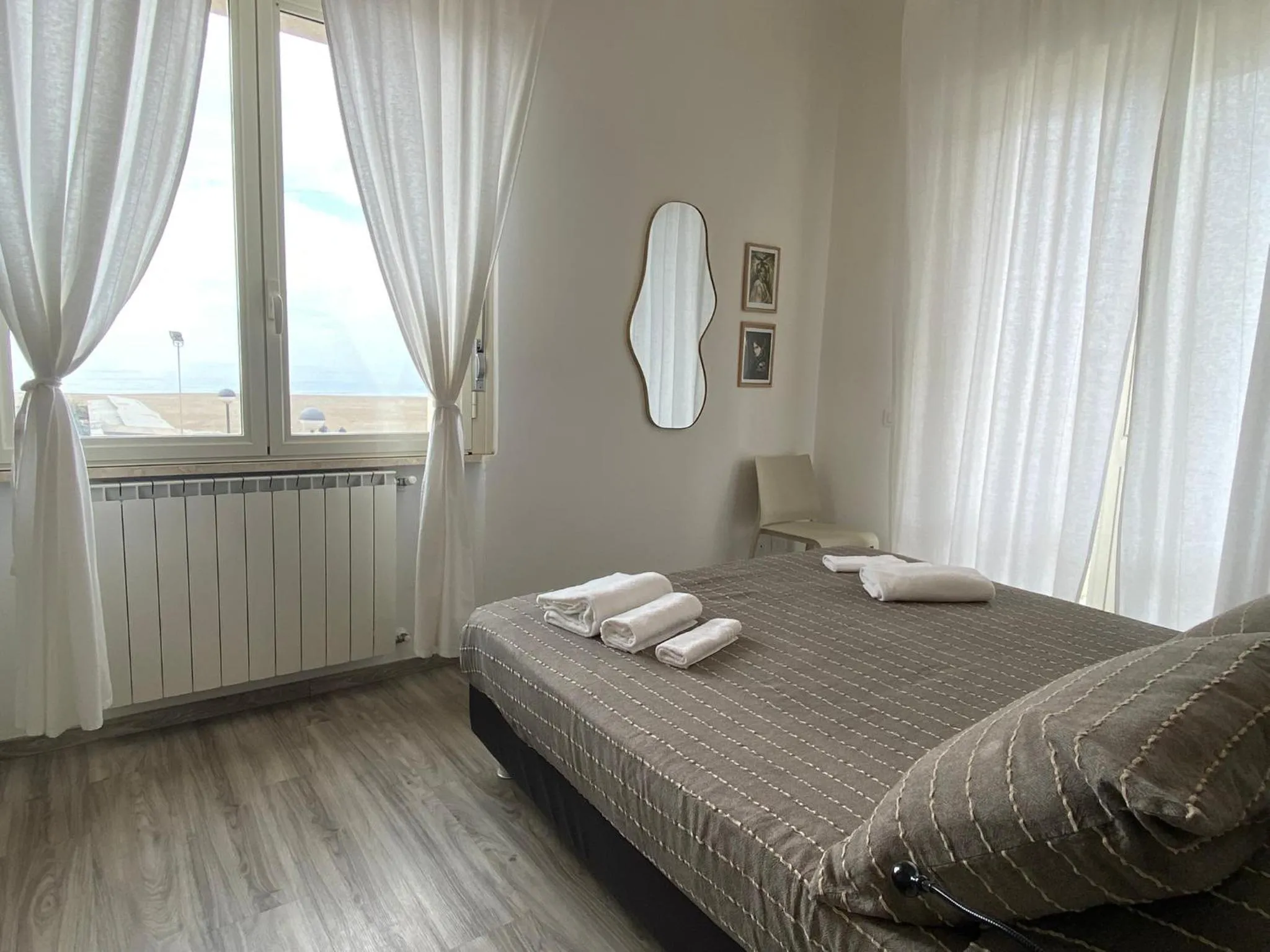 View (from property/room), Bed in Appartamenti Le Perle di Venere