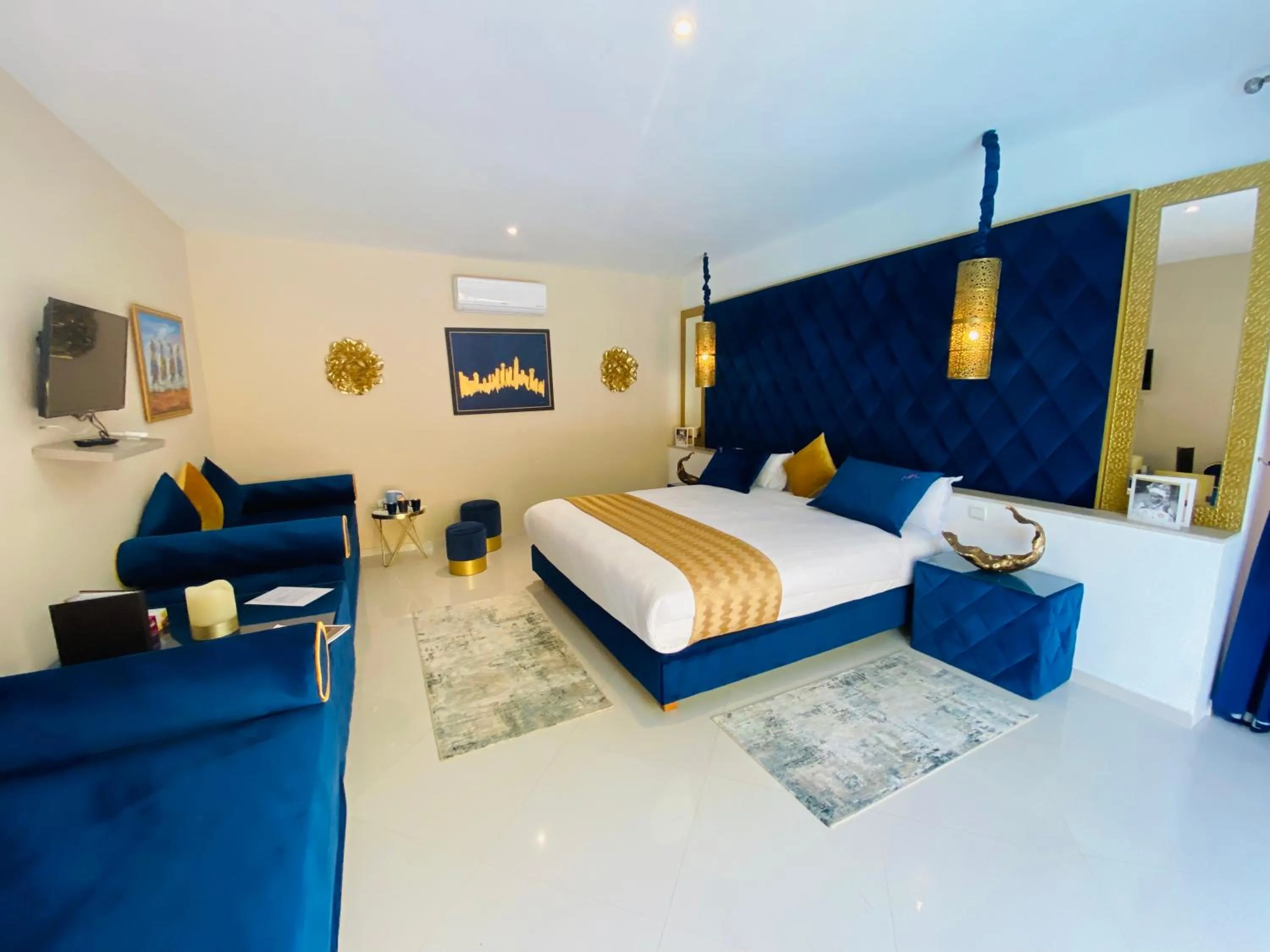 Communal lounge/ TV room, Bed in Eden Lodges & SPA-Boutique Hôtel de Luxe