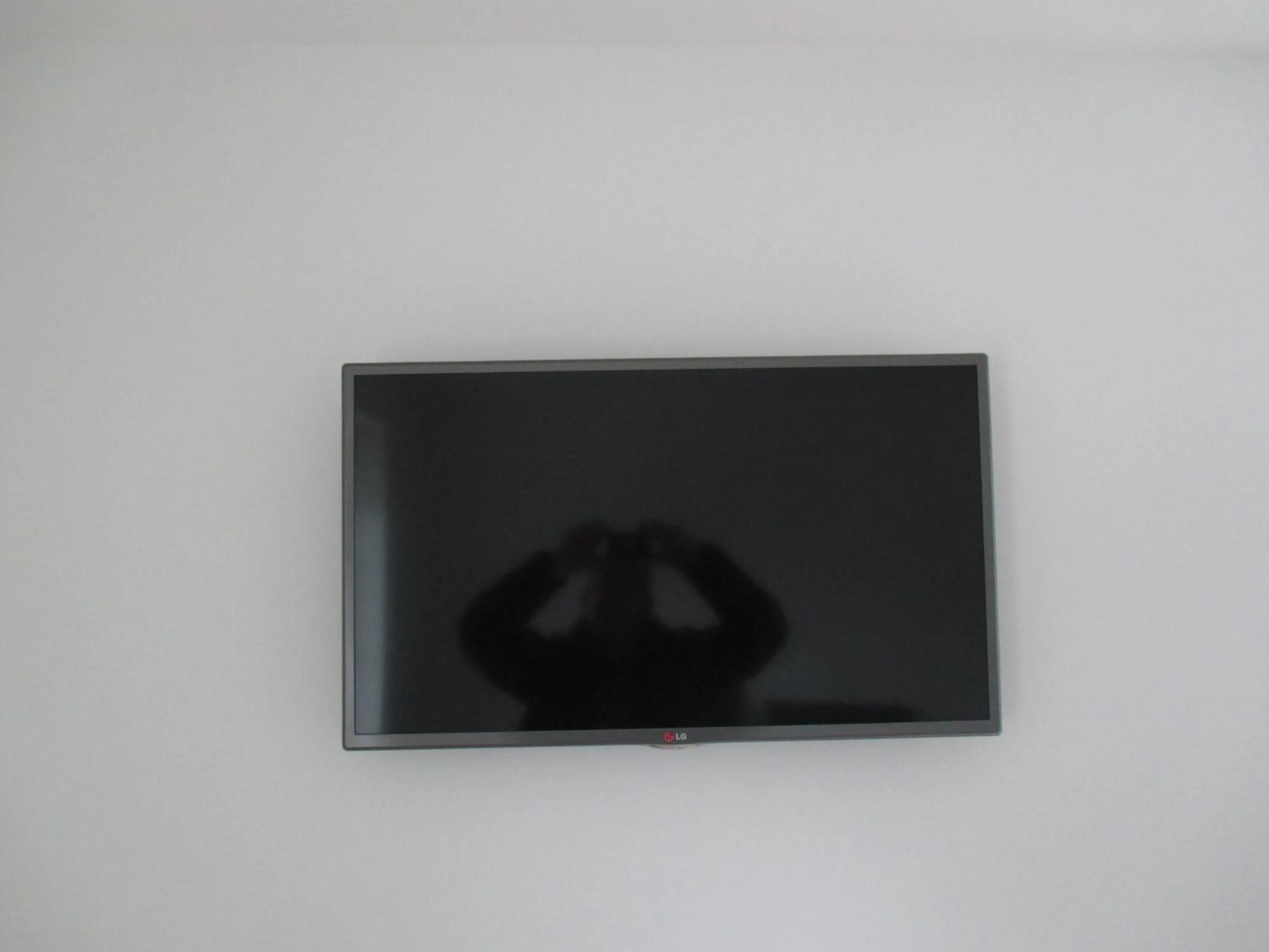 TV and multimedia in White House Hotel Apartments