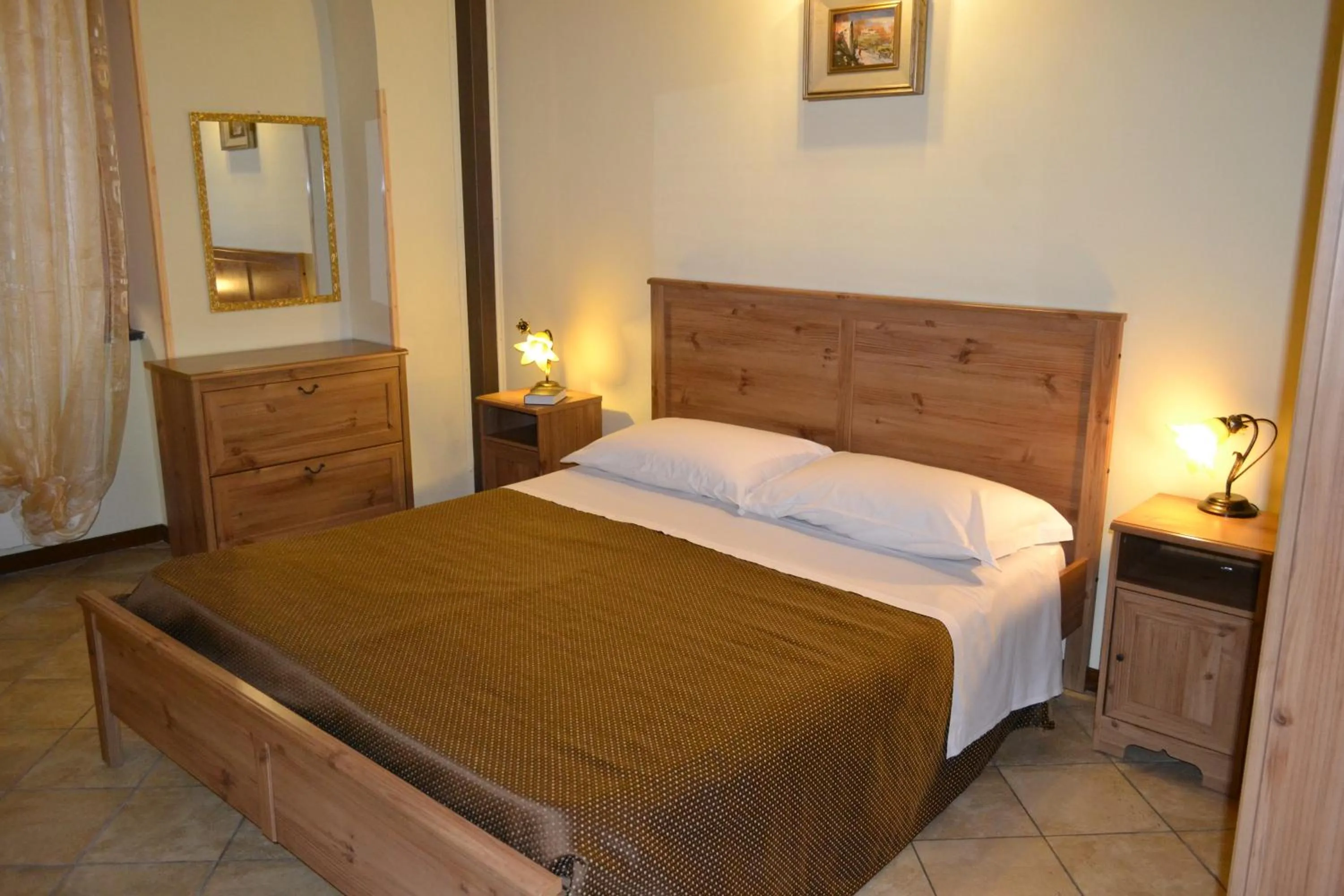 Photo of the whole room, Bed in Antiche Melodie