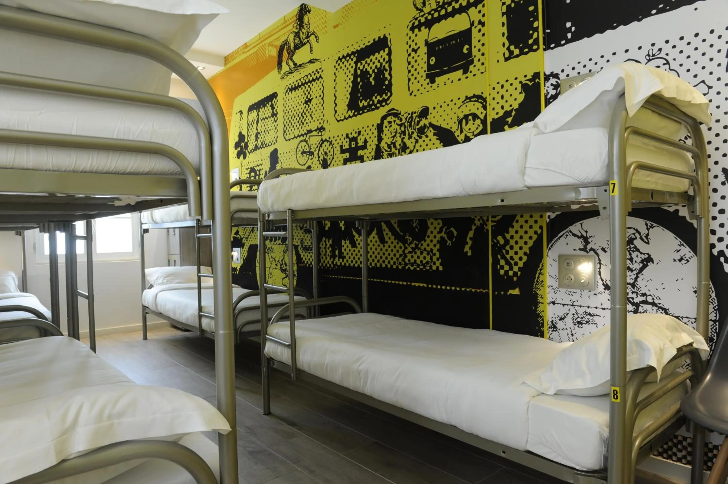 Photo of the whole room, Bed in The 3 Ducks Eiffel Tower by Hiphophostels