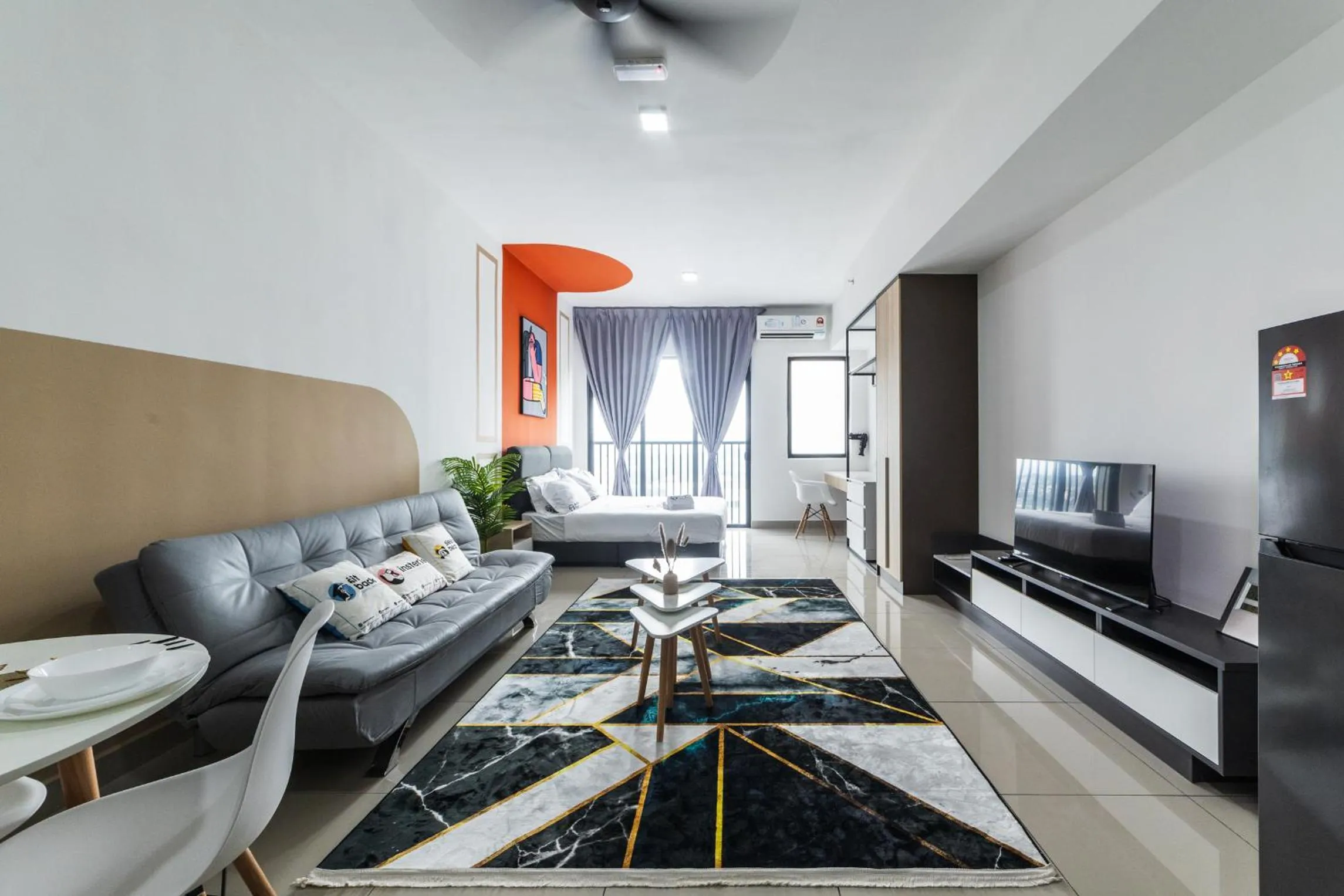 Living room in Alinea Suites Shah Alam by Sleepy Bear
