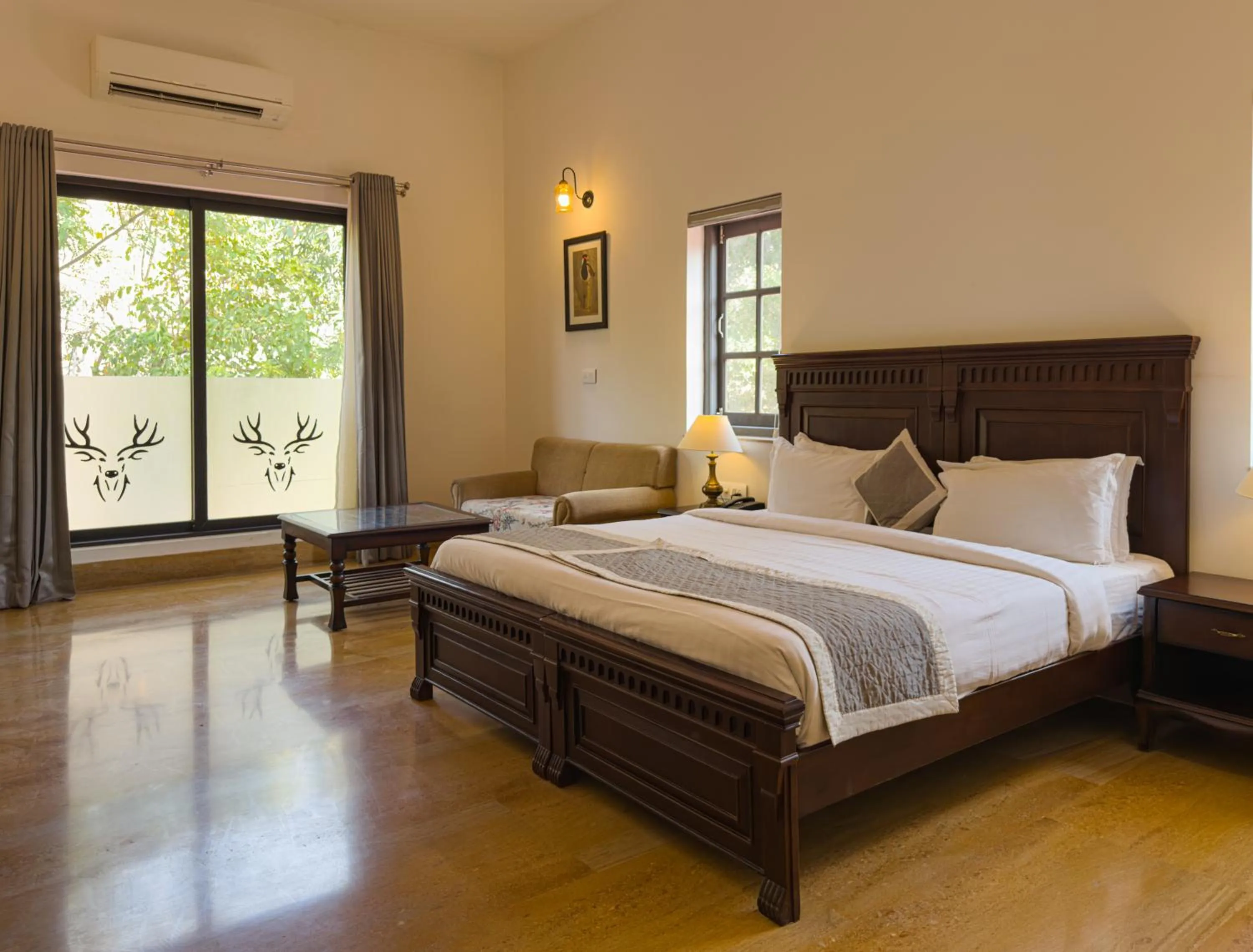 Bed in The Hunting Lodge - Luxury Resort in Udaipur