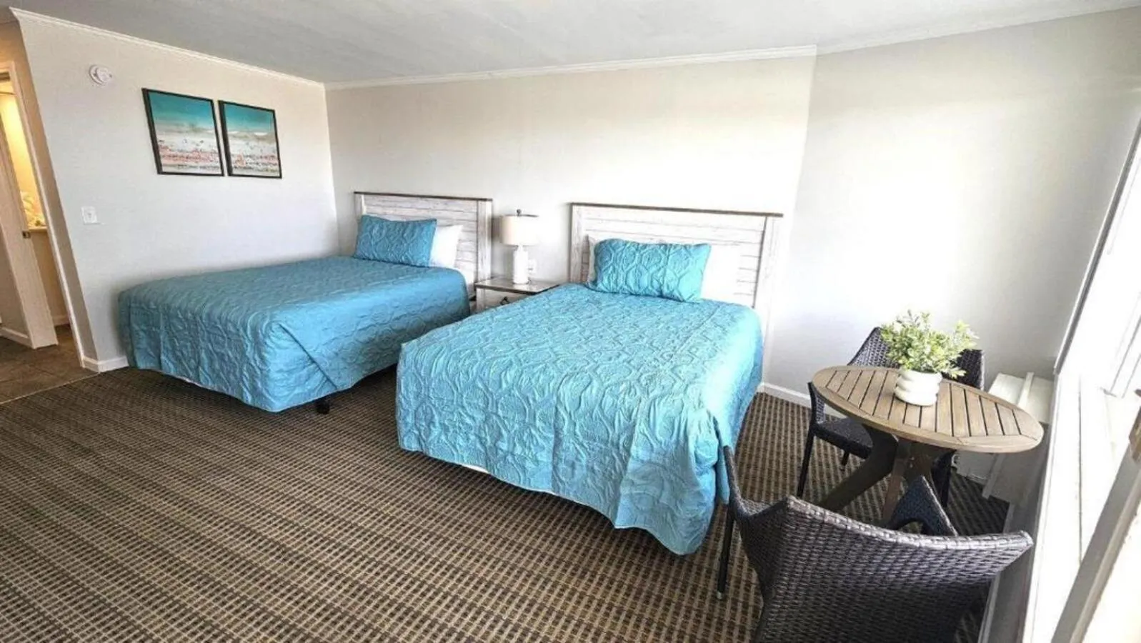 Bedroom, Bed in Aqua Beach Hotel