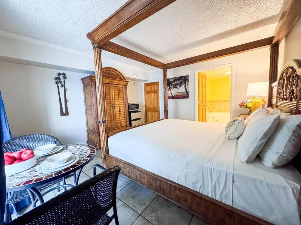 Living room, Bed in Aqua Beach Hotel