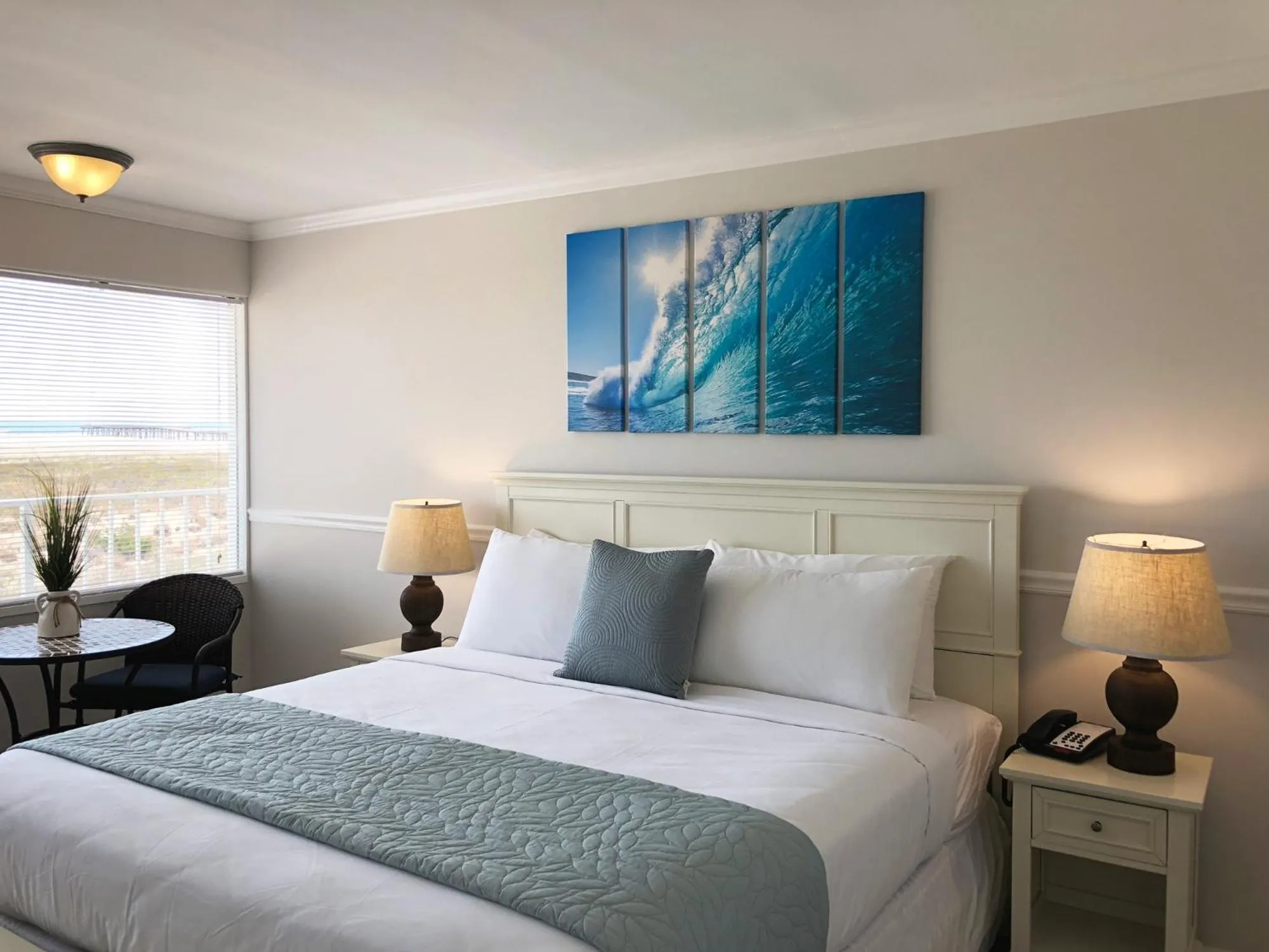 Bed in Aqua Beach Hotel