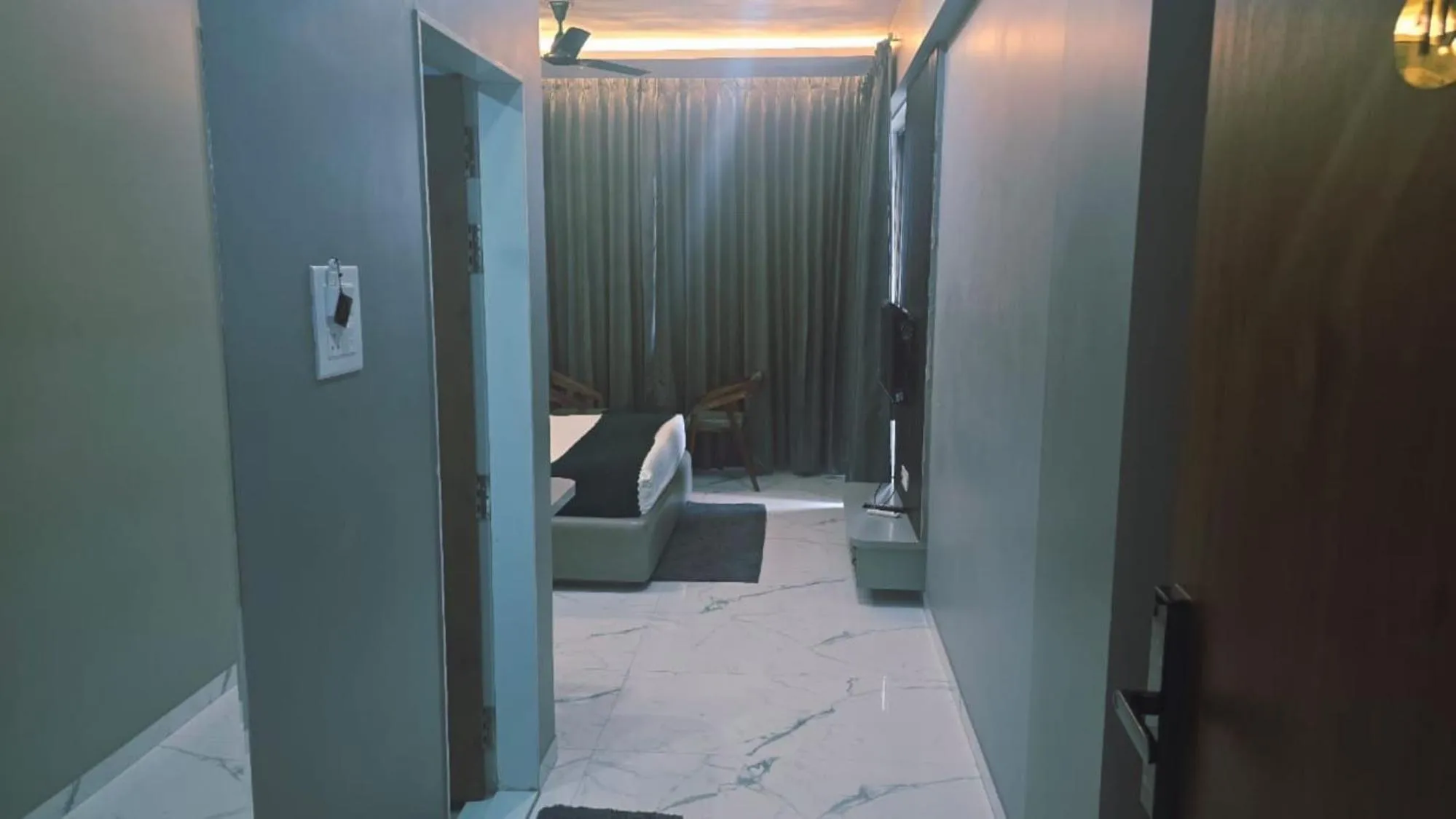 Living room, Bed in Hotel Laxmi Elite Karad