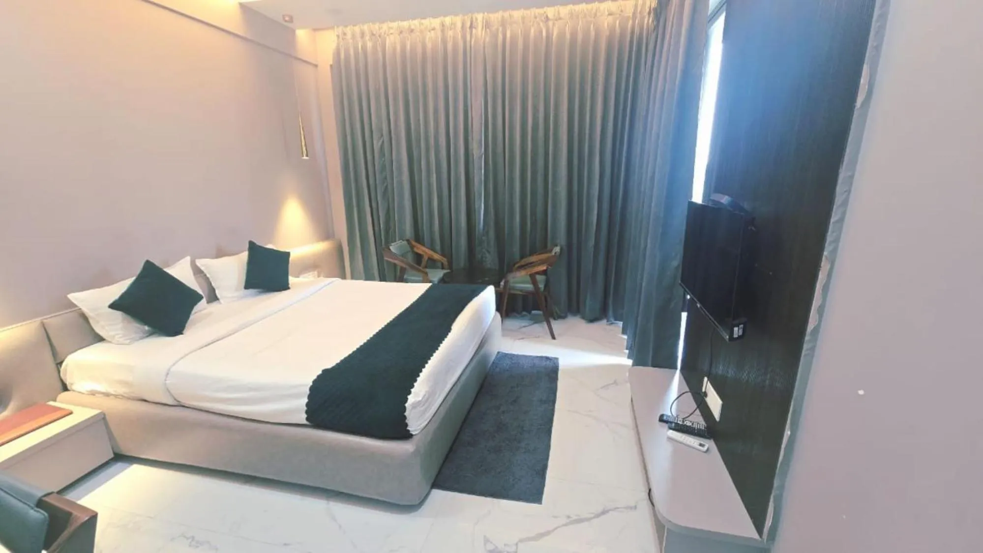 Bed in Hotel Laxmi Elite Karad