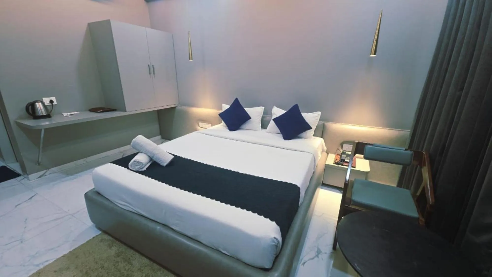 Bed in Hotel Laxmi Elite Karad