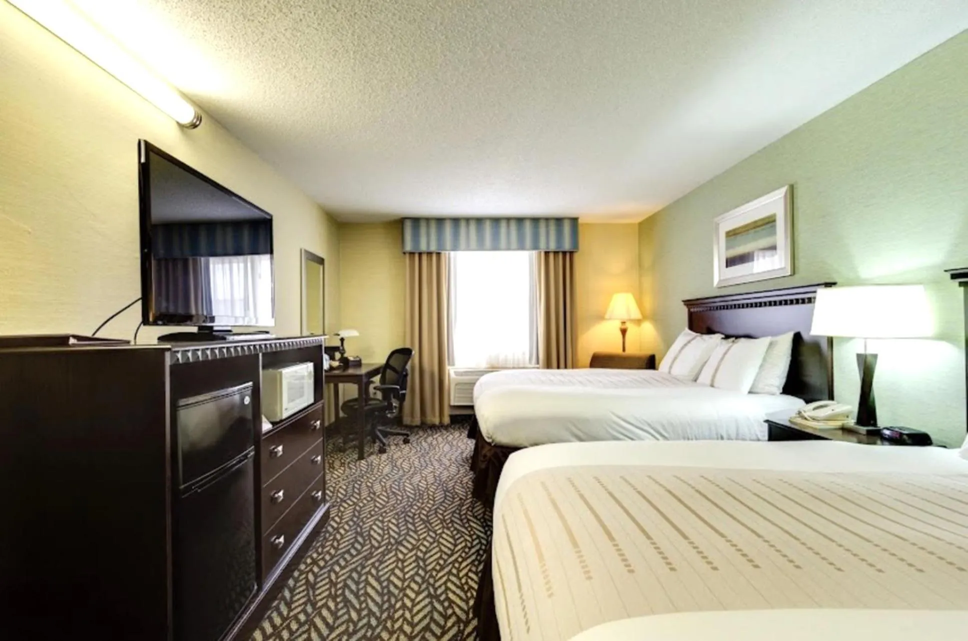 Bedroom, Bed in Fireside Inn and Suites