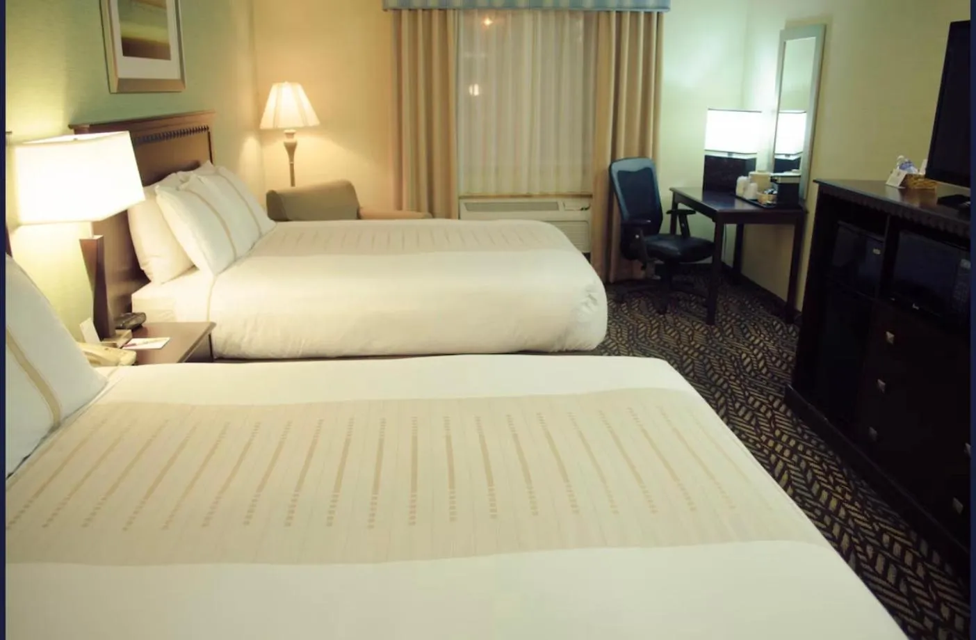 Bedroom, Bed in Fireside Inn and Suites