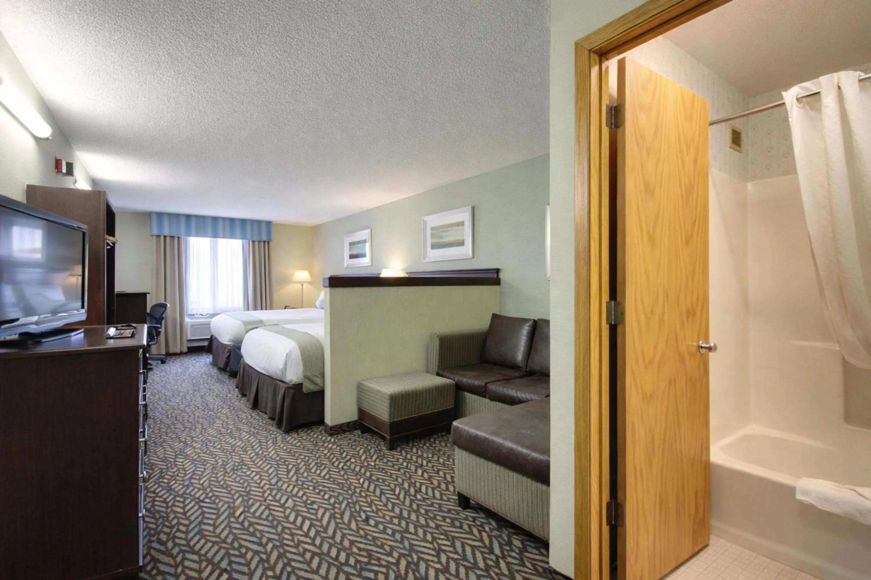 Bedroom, Bed in Fireside Inn and Suites