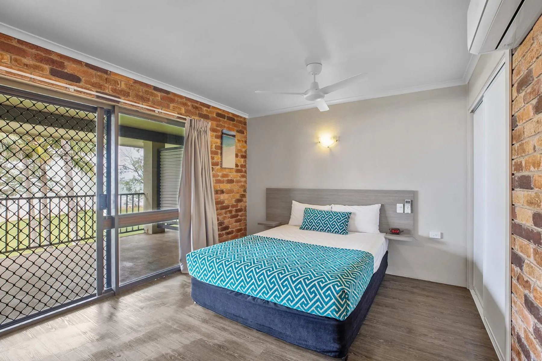 Bed in Sarina Beach Motel