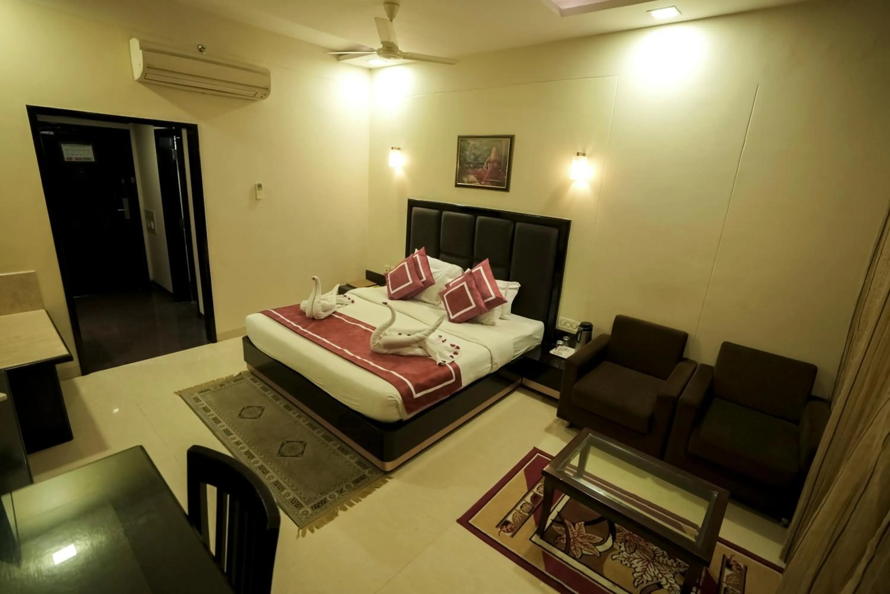 Photo of the whole room, Bed in Chandra Imperial