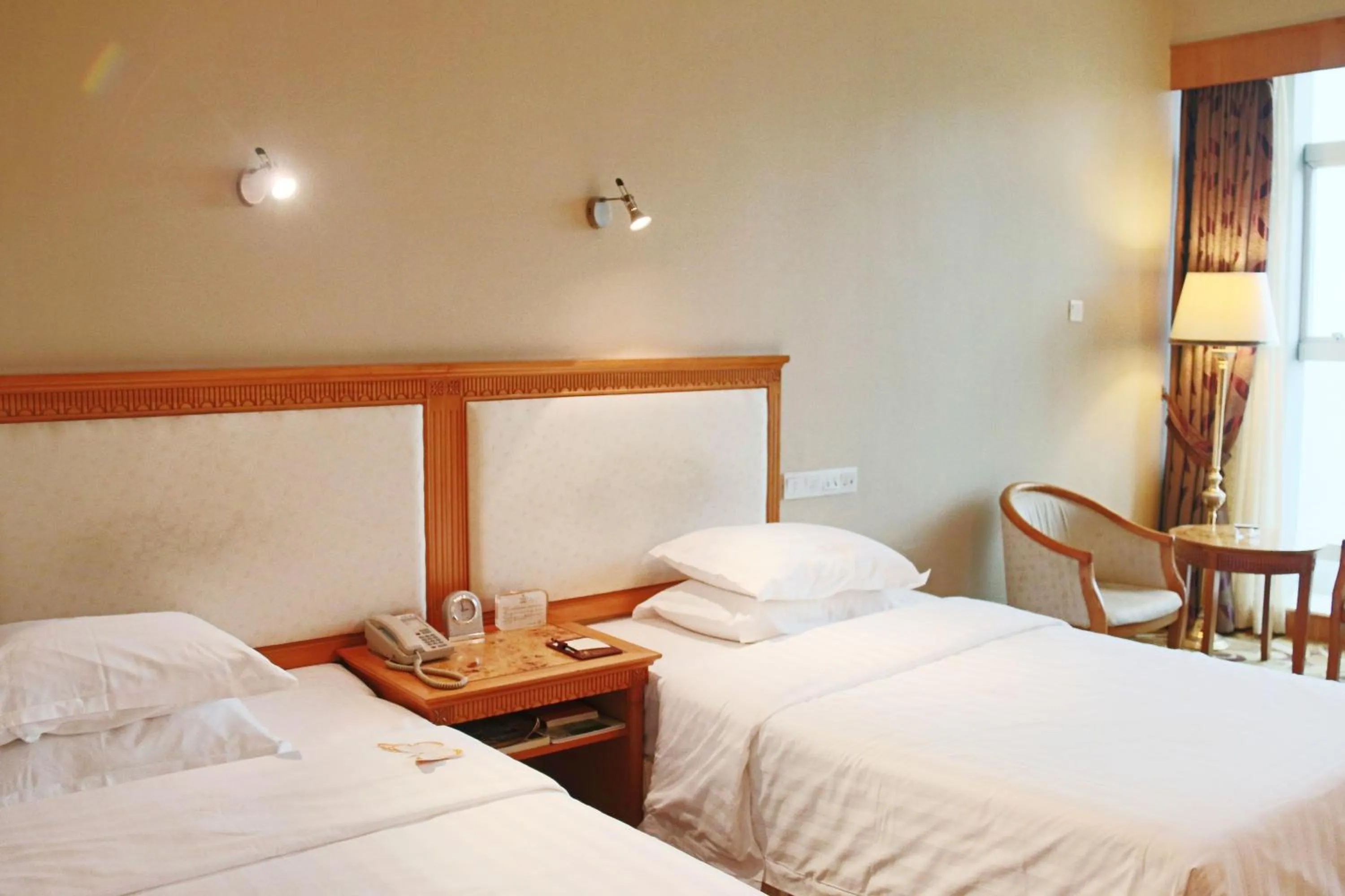 Bed in Zhuhai Dehan Hotel