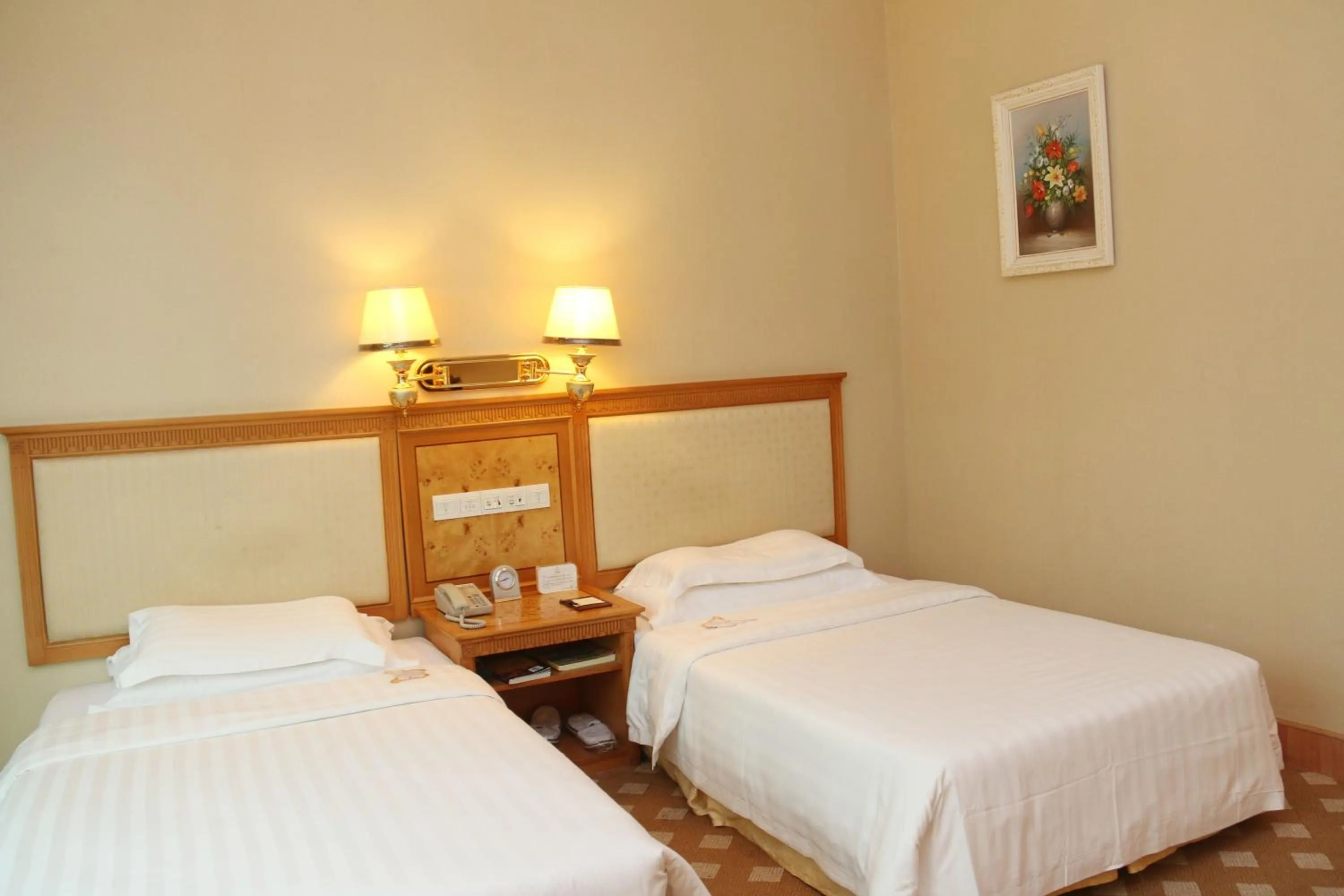 Bed in Zhuhai Dehan Hotel