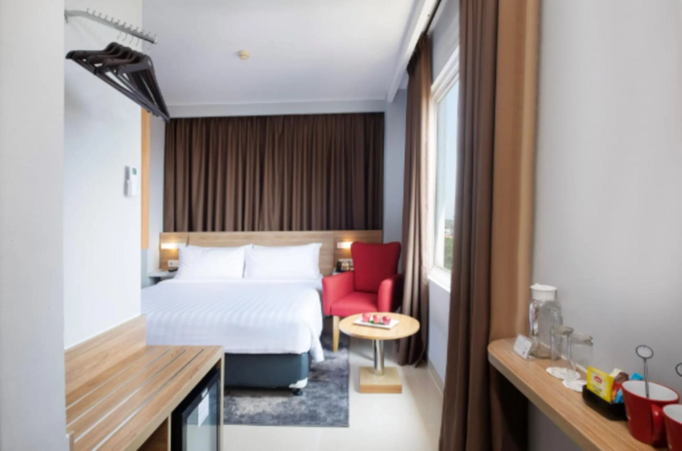 Bedroom, Bed in Hotel NEO Cirebon by ASTON