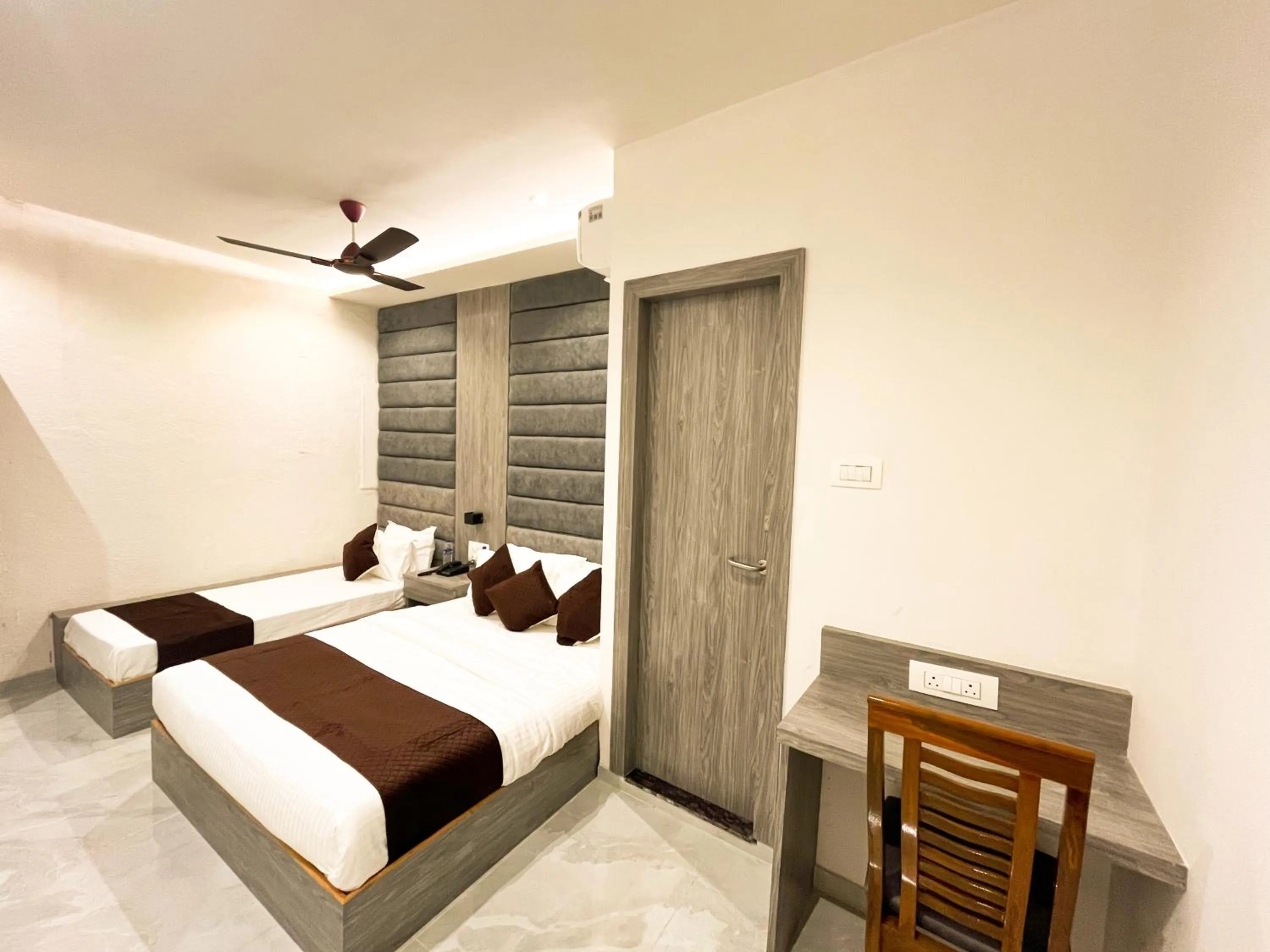 Bed in Hotel Grand Executive