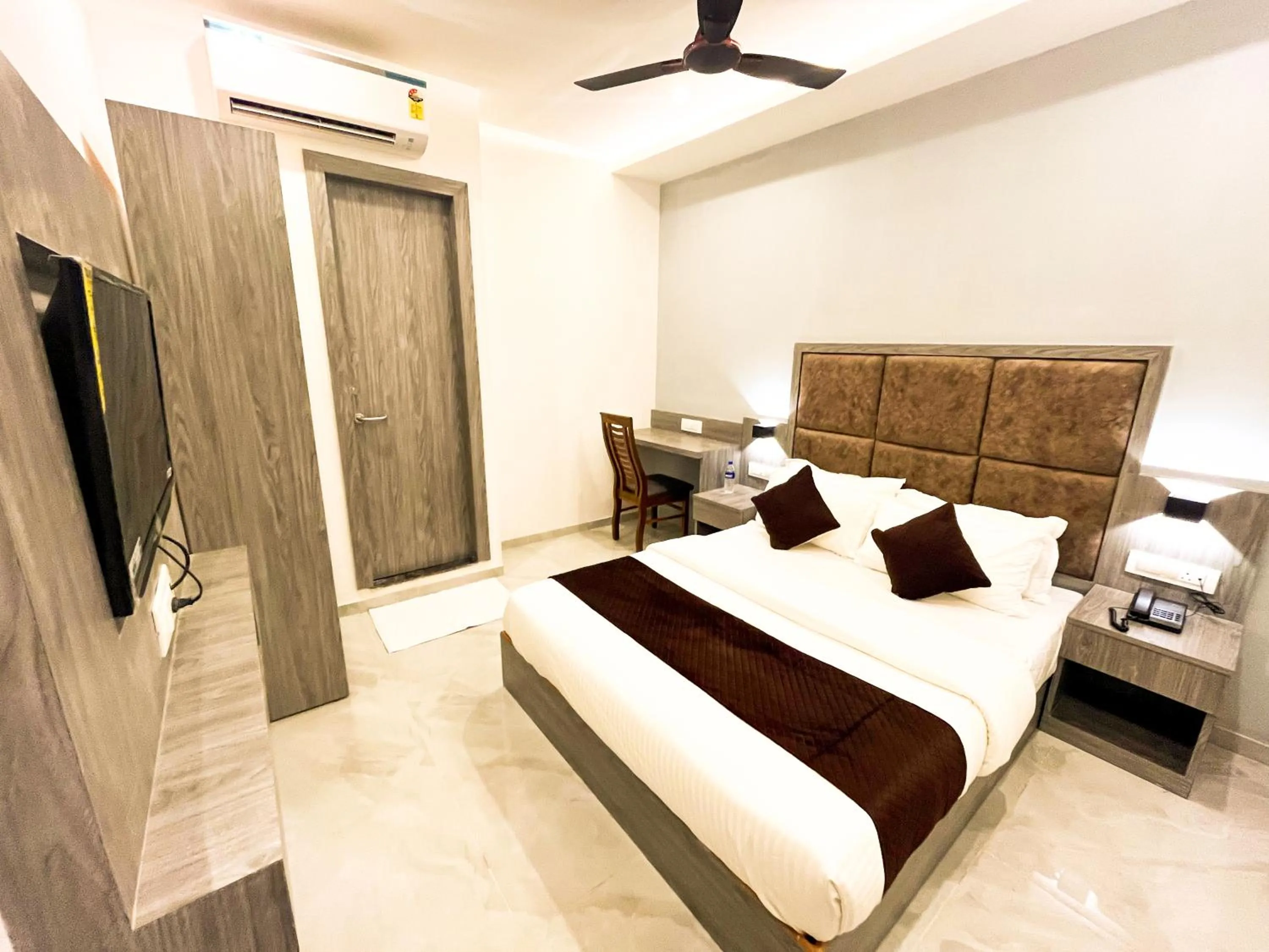 Bed in Hotel Grand Executive