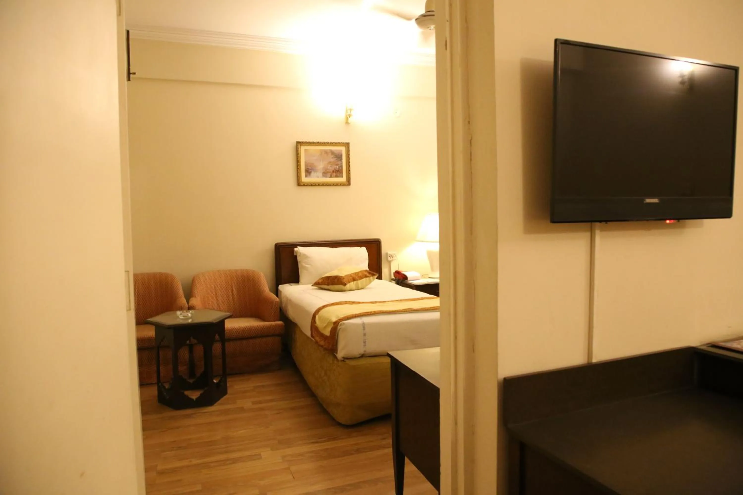 View (from property/room), Bed in Carlton Tower Hotel Lahore