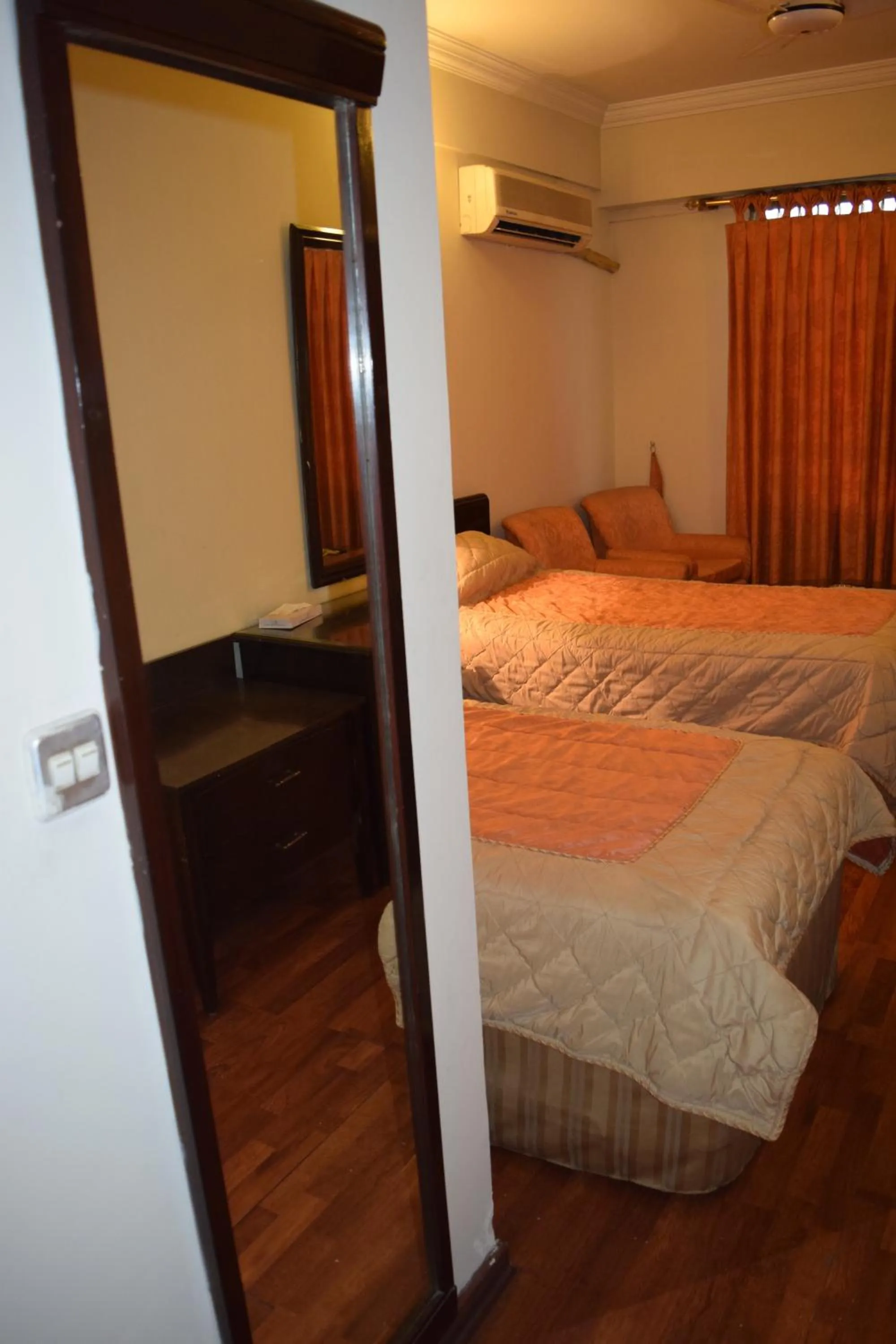 Photo of the whole room, Bed in Carlton Tower Hotel Lahore