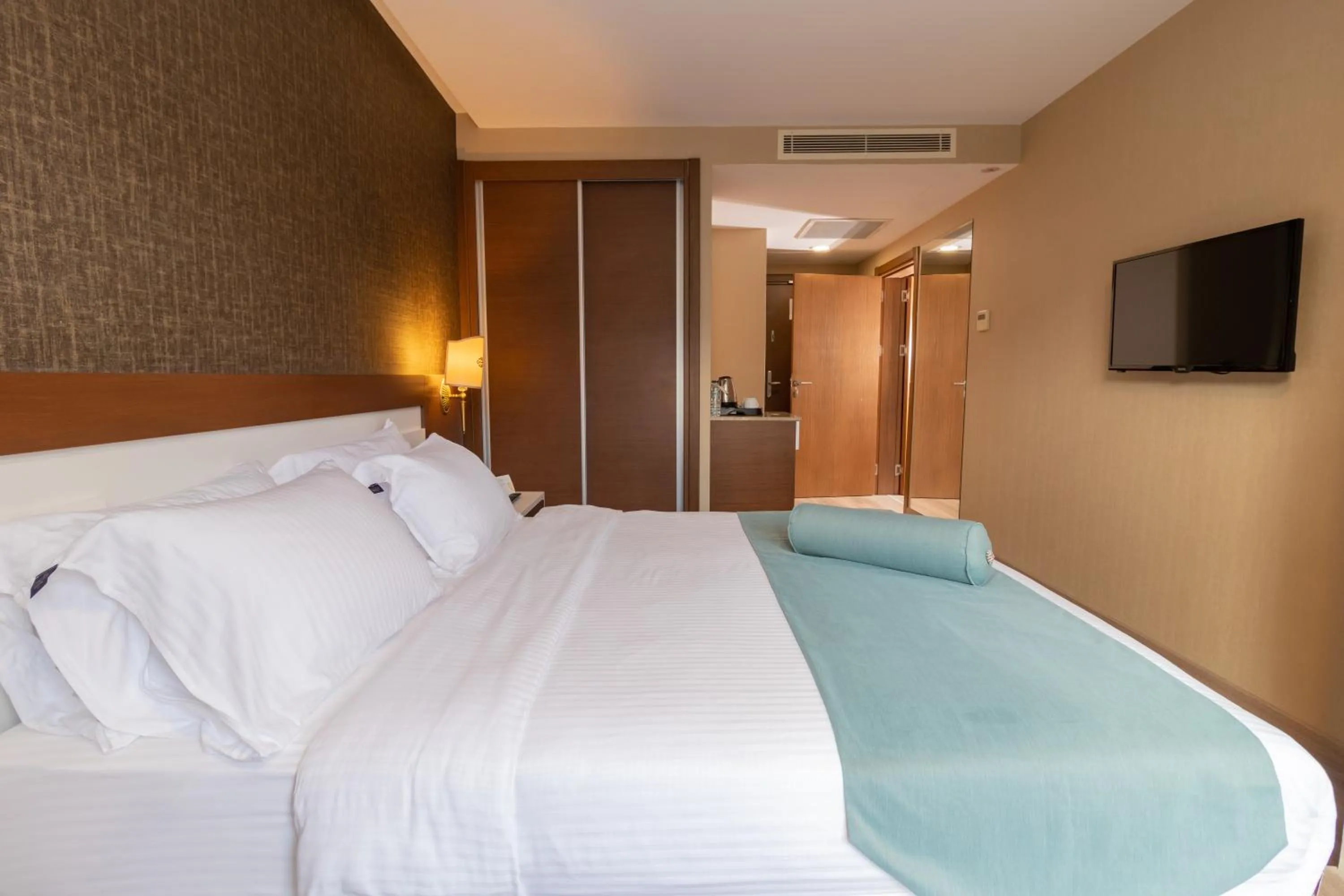 Bed in Tilya Resort Hotel