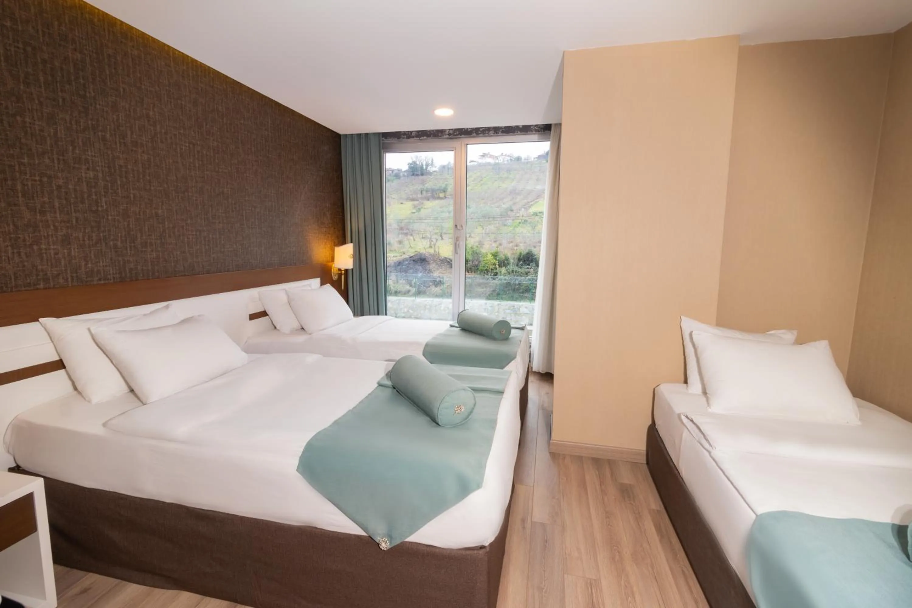 Bed in Tilya Resort Hotel