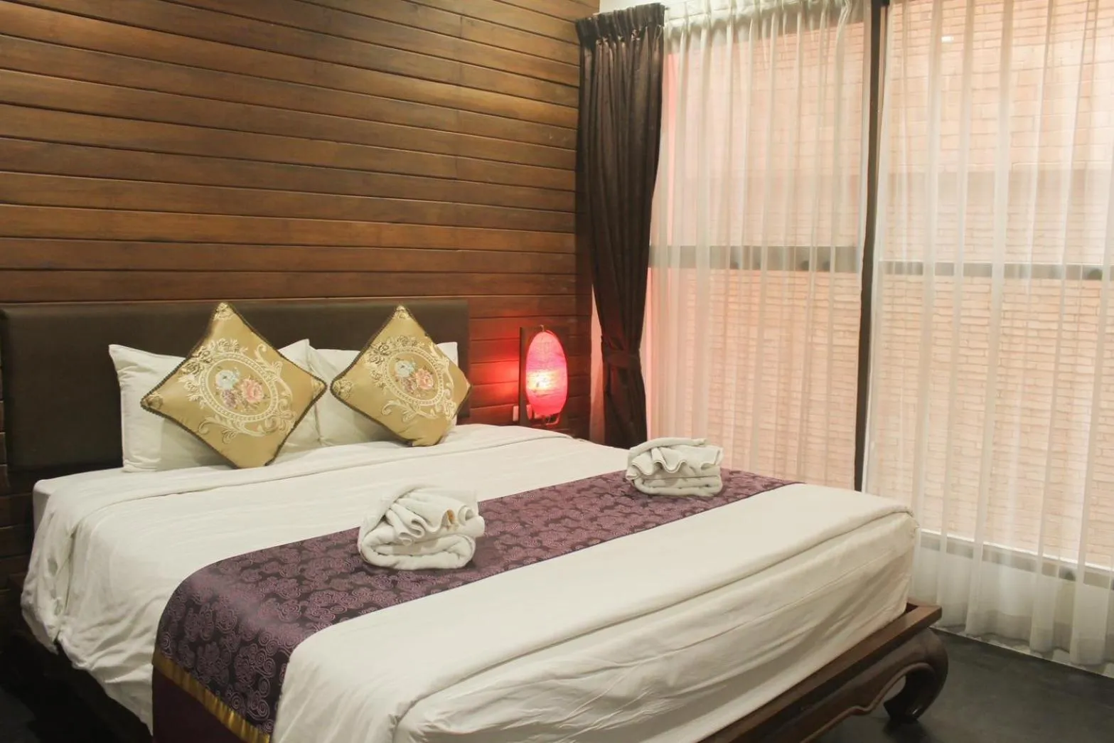 Bed in The Guest Arak Boutique Hotel