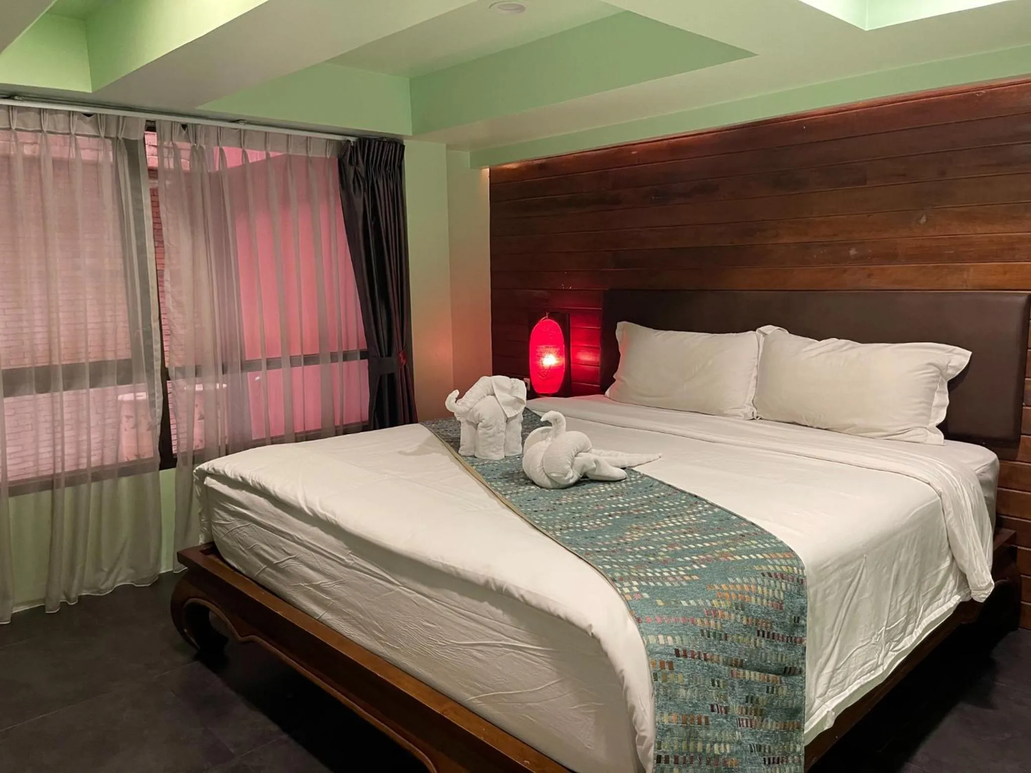 Bed in The Guest Arak Boutique Hotel