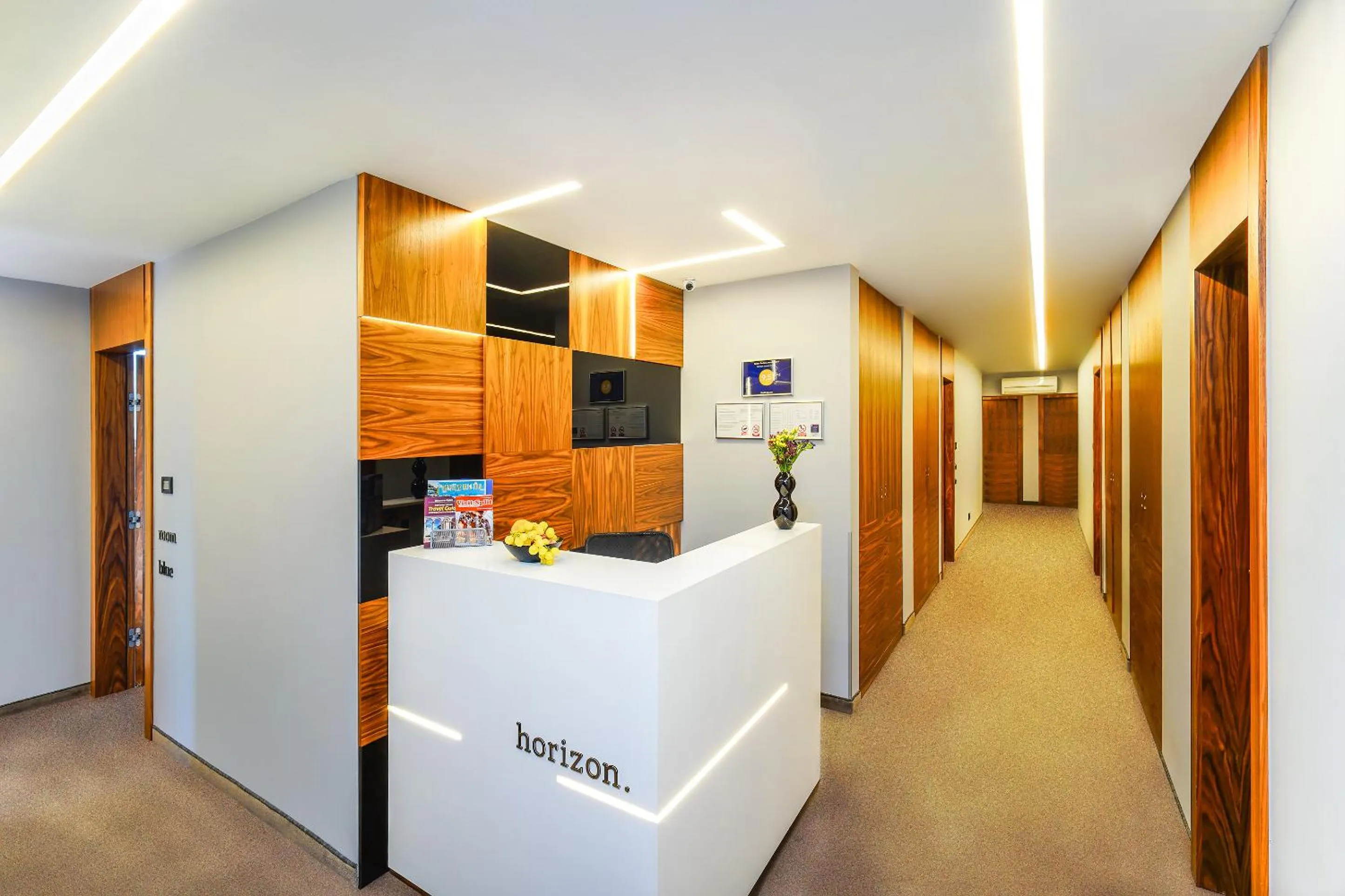 Property logo or sign in Horizon Luxury Suites & Design Rooms