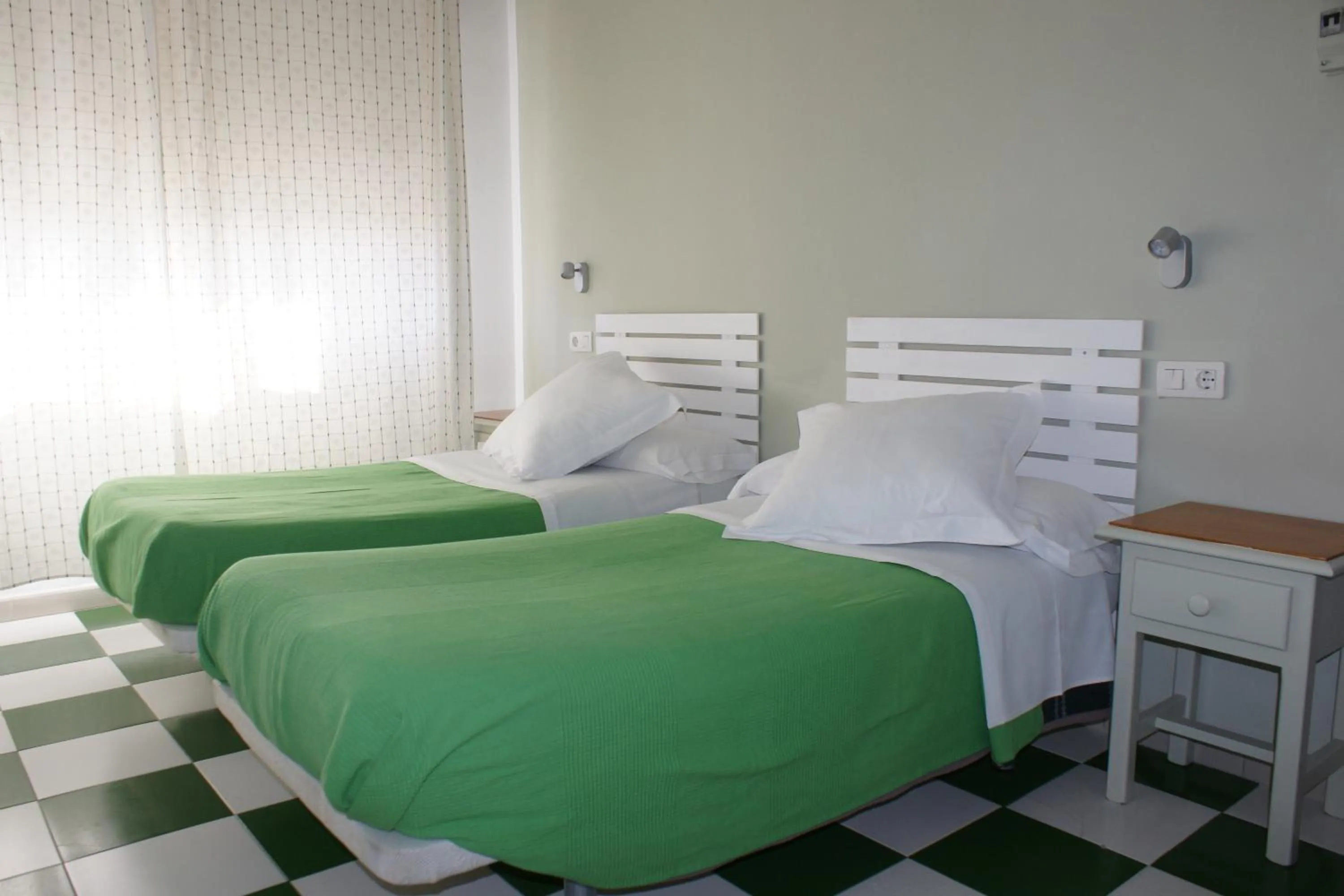 Bed in Hostal Puerto Beach