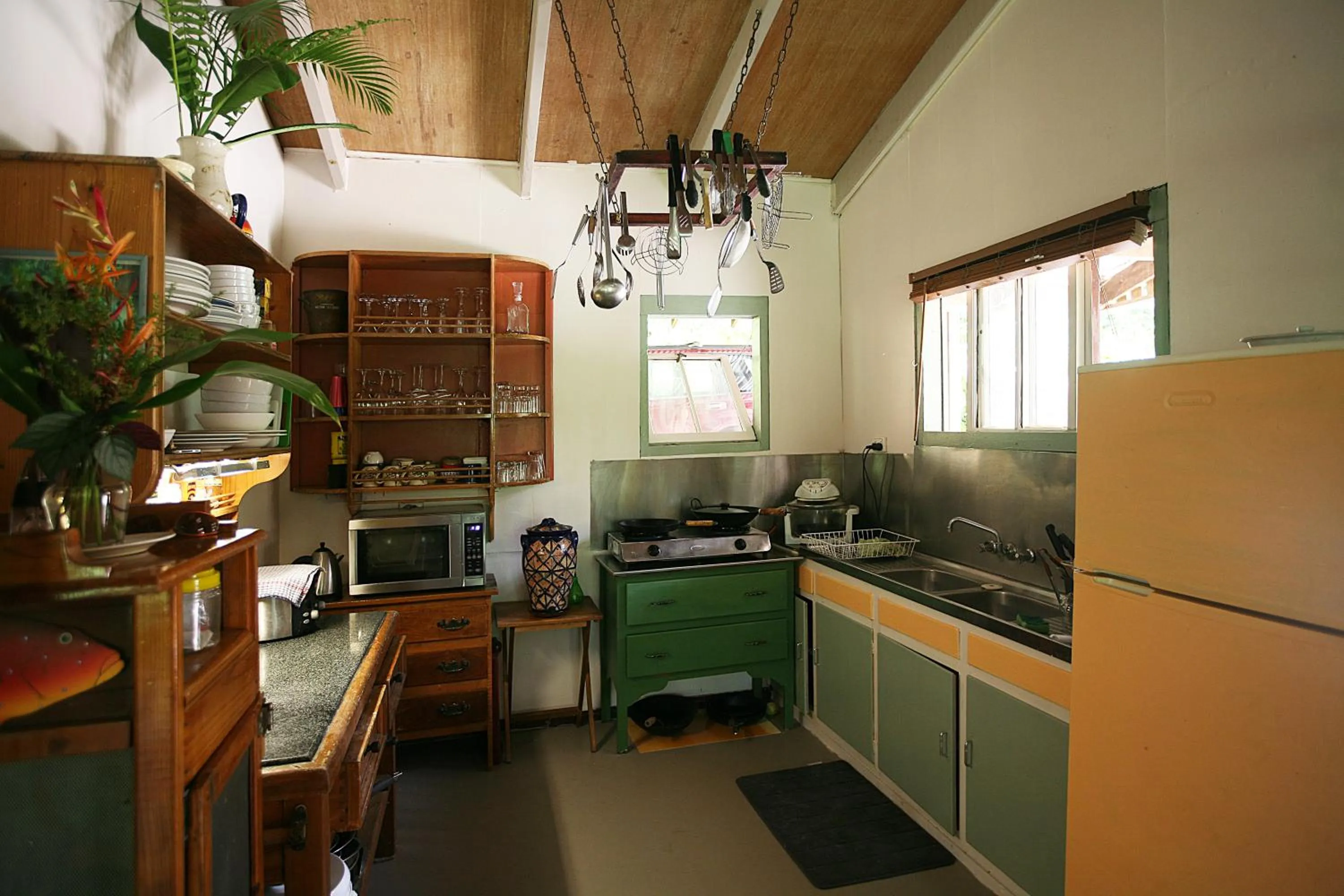 Communal kitchen in Tropical Bliss bed and breakfast