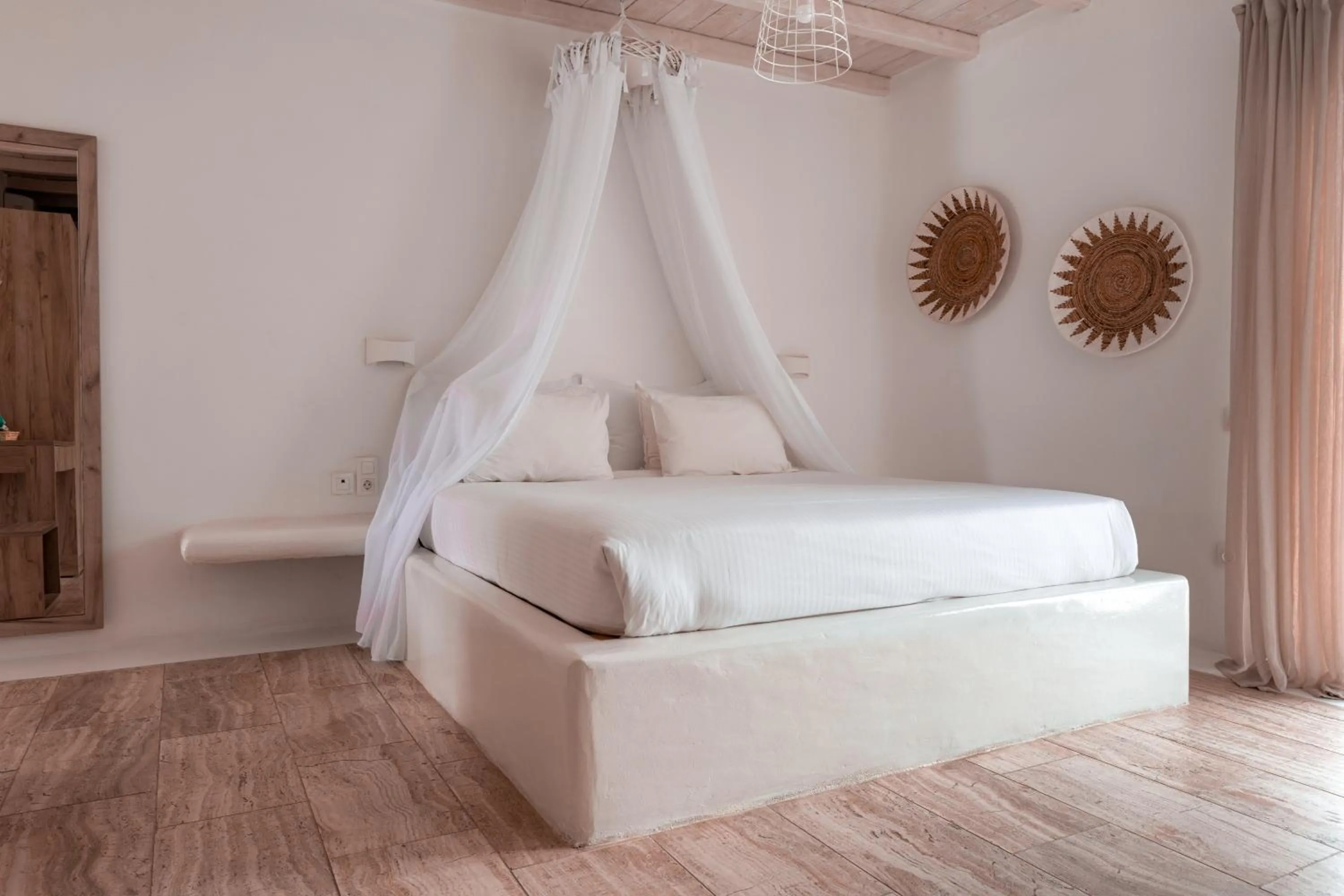 Bed in Senses Luxury Suites & Villas