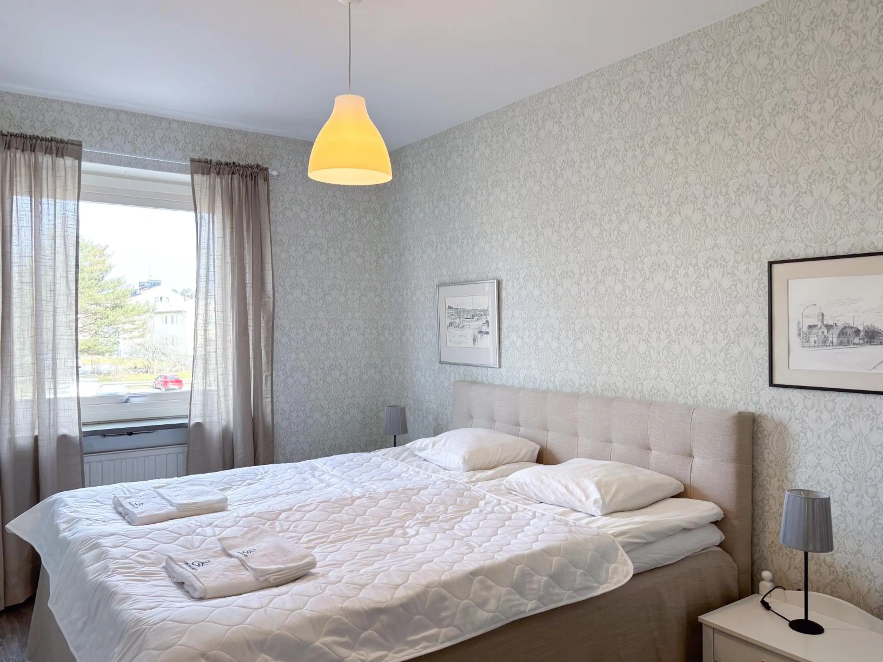 Bed in Säffle Suites by Svaneholm Hotel