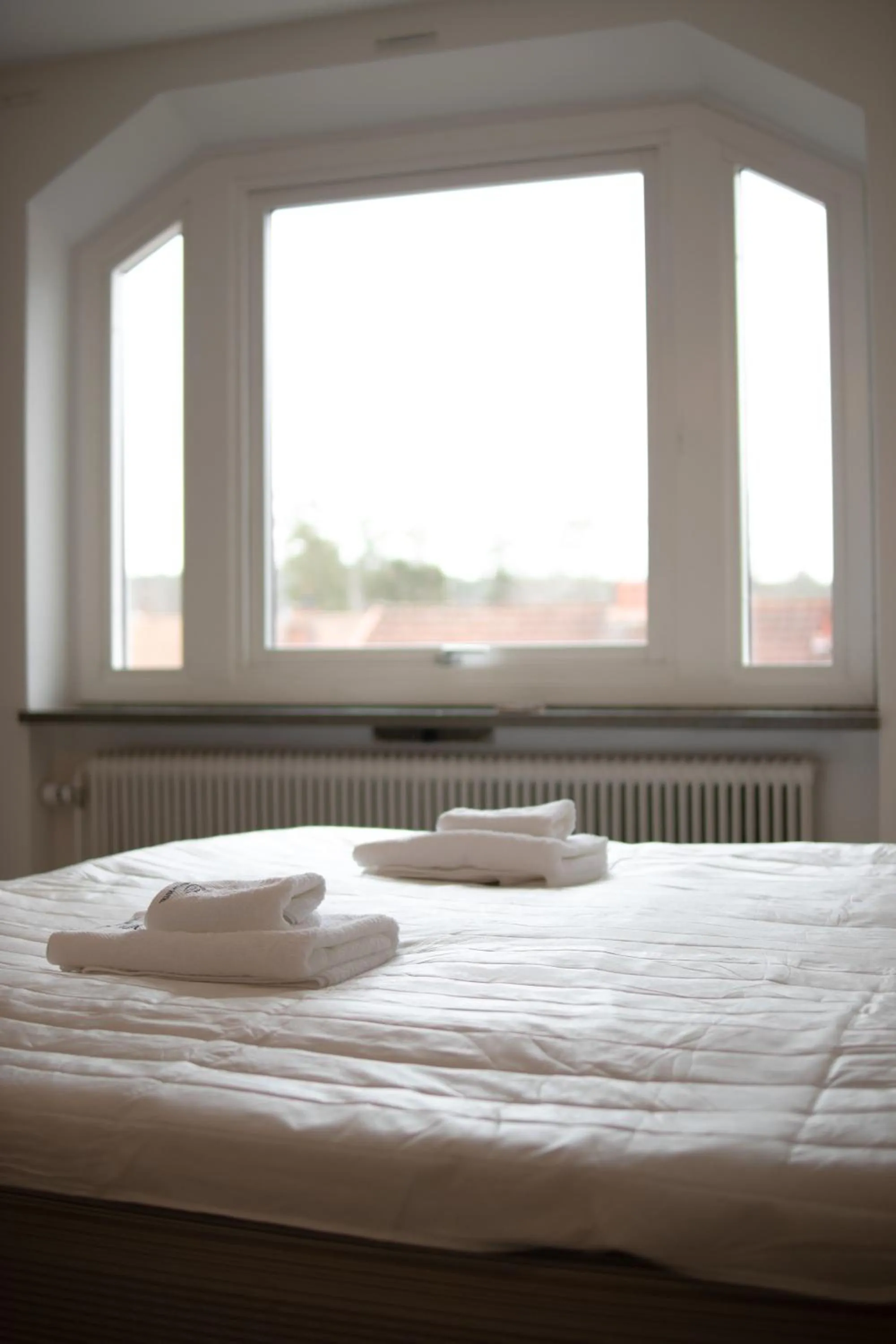 Bed in Säffle Suites by Svaneholm Hotel