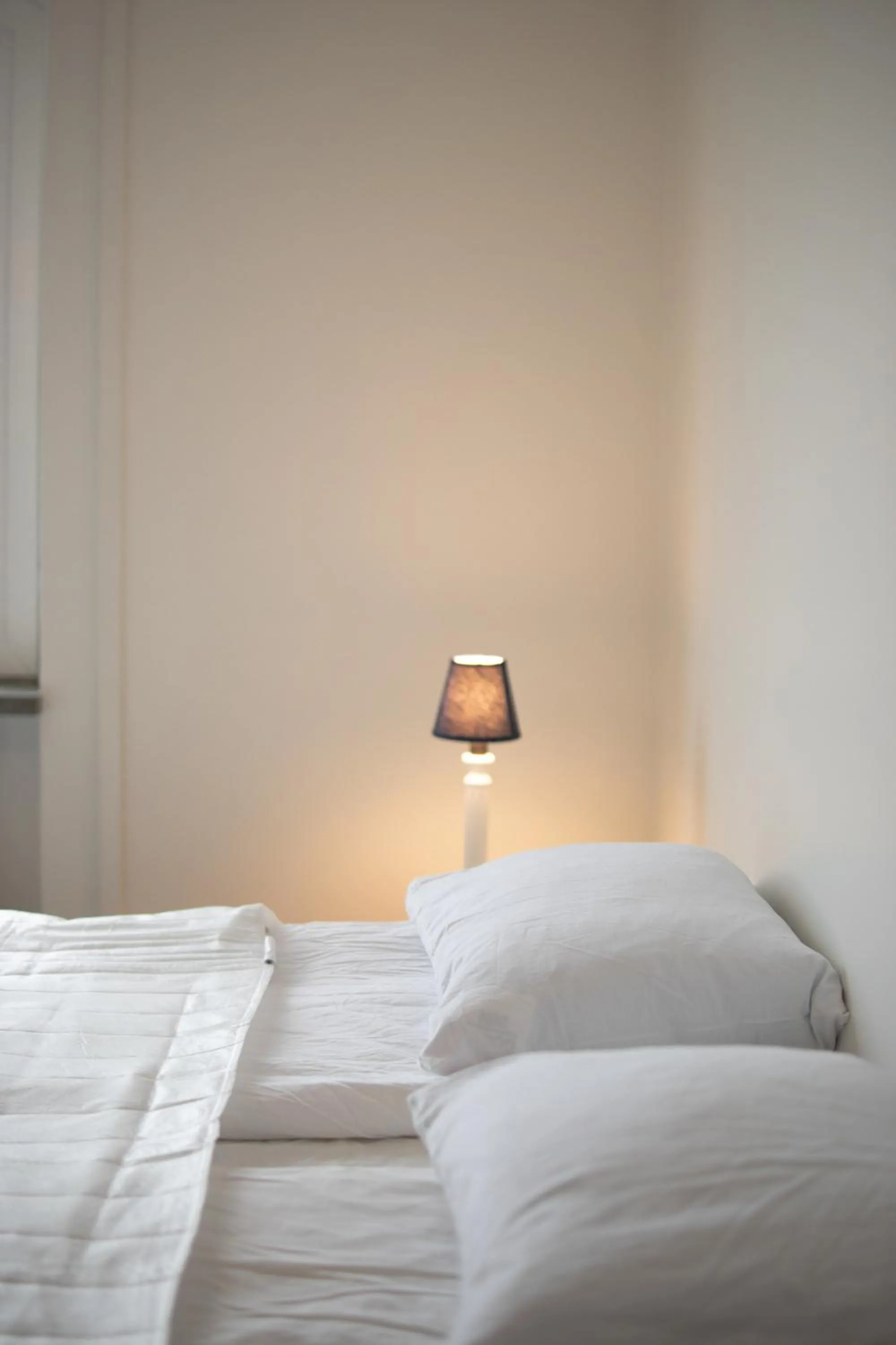 Bed in Säffle Suites by Svaneholm Hotel