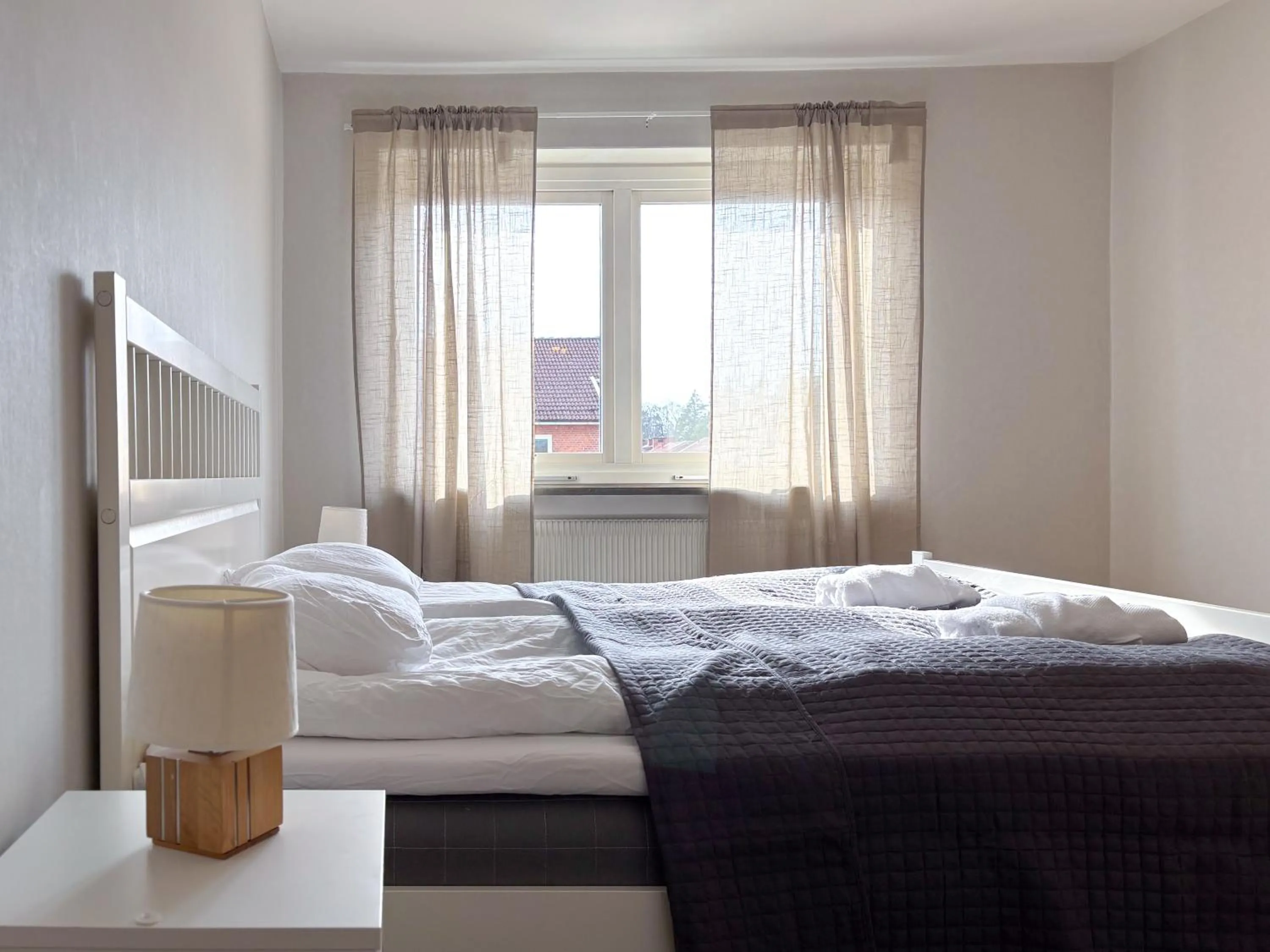 Bed in Säffle Suites by Svaneholm Hotel